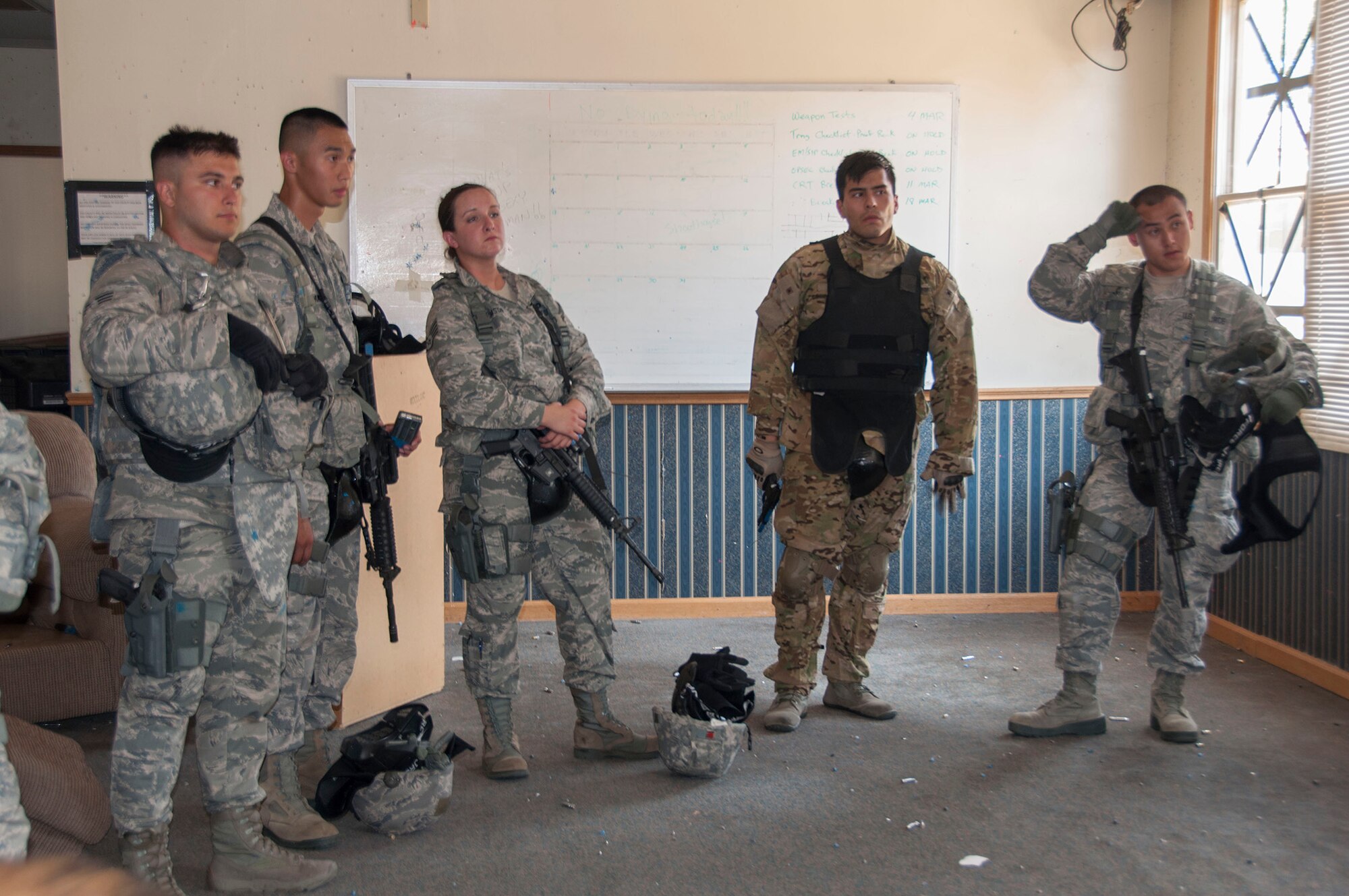 TRAVIS AIR FORCE BASE, Calif. -- Members of the 349th Security Forces Squadron participate in an active shooter exercise at Travis Air Force Base, Calif., July 13, 2014. (U.S. Air Force photo / Staff Sgt. Amelia Leonard)
