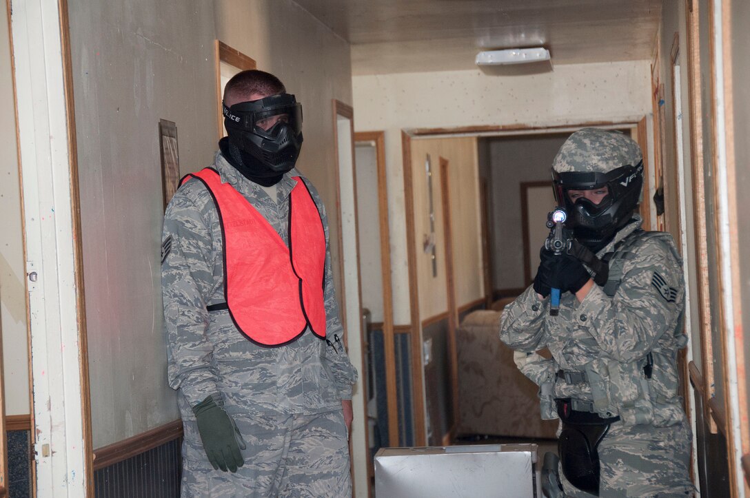 TRAVIS AIR FORCE BASE, Calif. -- Members of the 349th Security Forces Squadron participate in an active shooter exercise at Travis Air Force Base, Calif., July 13, 2014. (U.S. Air Force photo / Staff Sgt. Amelia Leonard)
