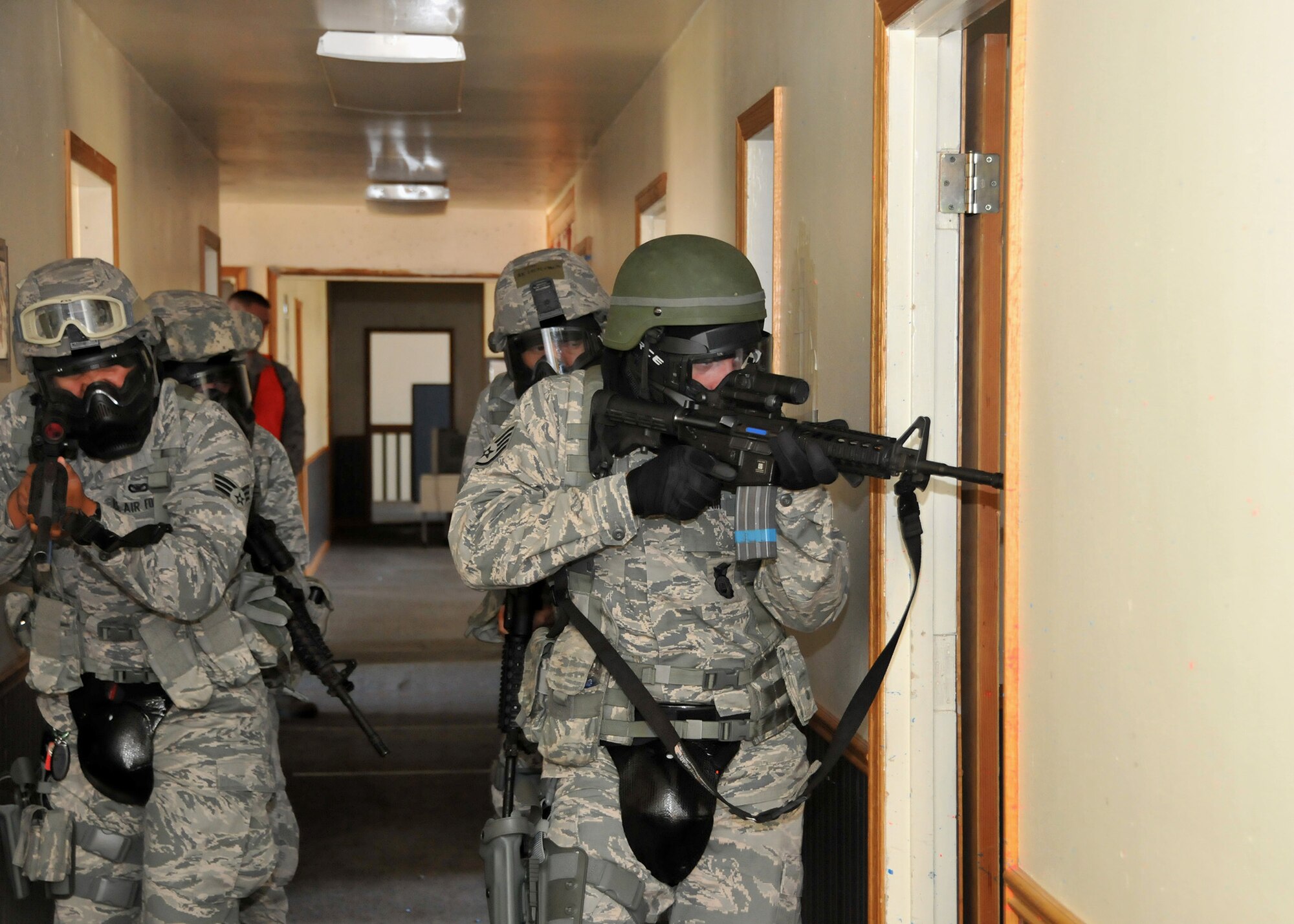 TRAVIS AIR FORCE BASE, Calif. -- Members of the 349th Security Forces Squadron participate in an active shooter exercise at Travis Air Force Base, Calif., July 13, 2014. (U.S. Air Force photo / Staff Sgt. Amelia Leonard)
