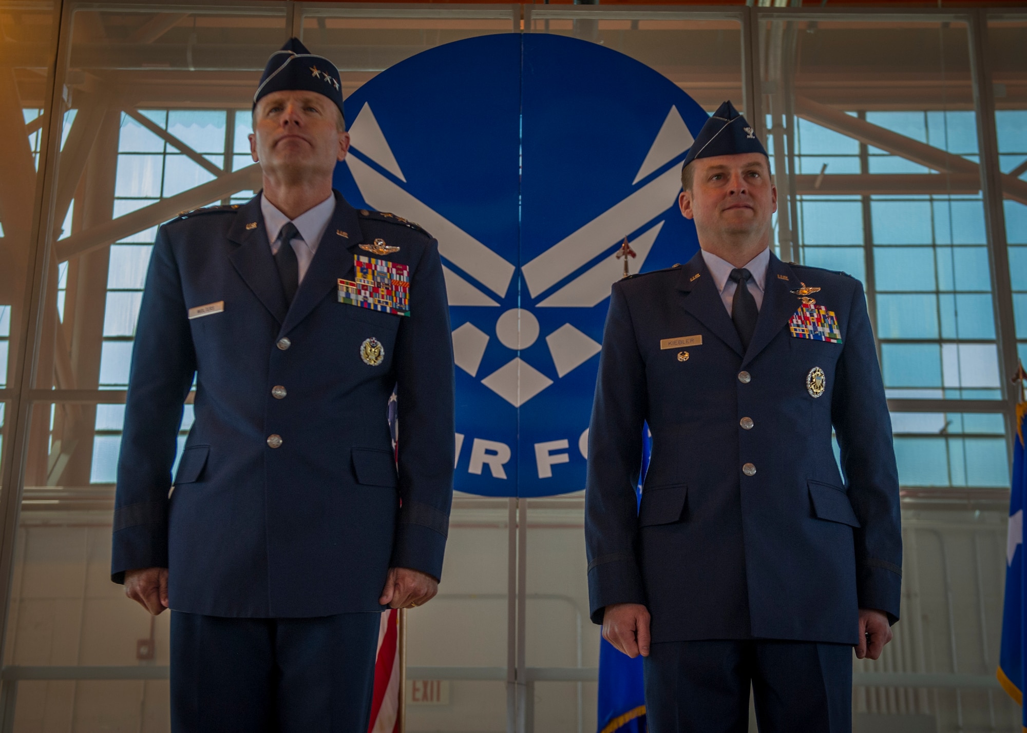 Lieutenant General Tod D. Wolters, 12th Air Force (Air Forces Southern) commander, and Col. Robert Kiebler, upcoming 49th Wing commander, stand while Ruffles and Flourishes are played for the arrival of the official party during an assumption of command ceremony at Holloman Air Force Base, N.M., July 18. Wolters visited Holloman to officiate Kiebler’s assumption of command of the 49th Wing. (U.S. Air Force photo by Airman 1st Class Aaron Montoya / Released)