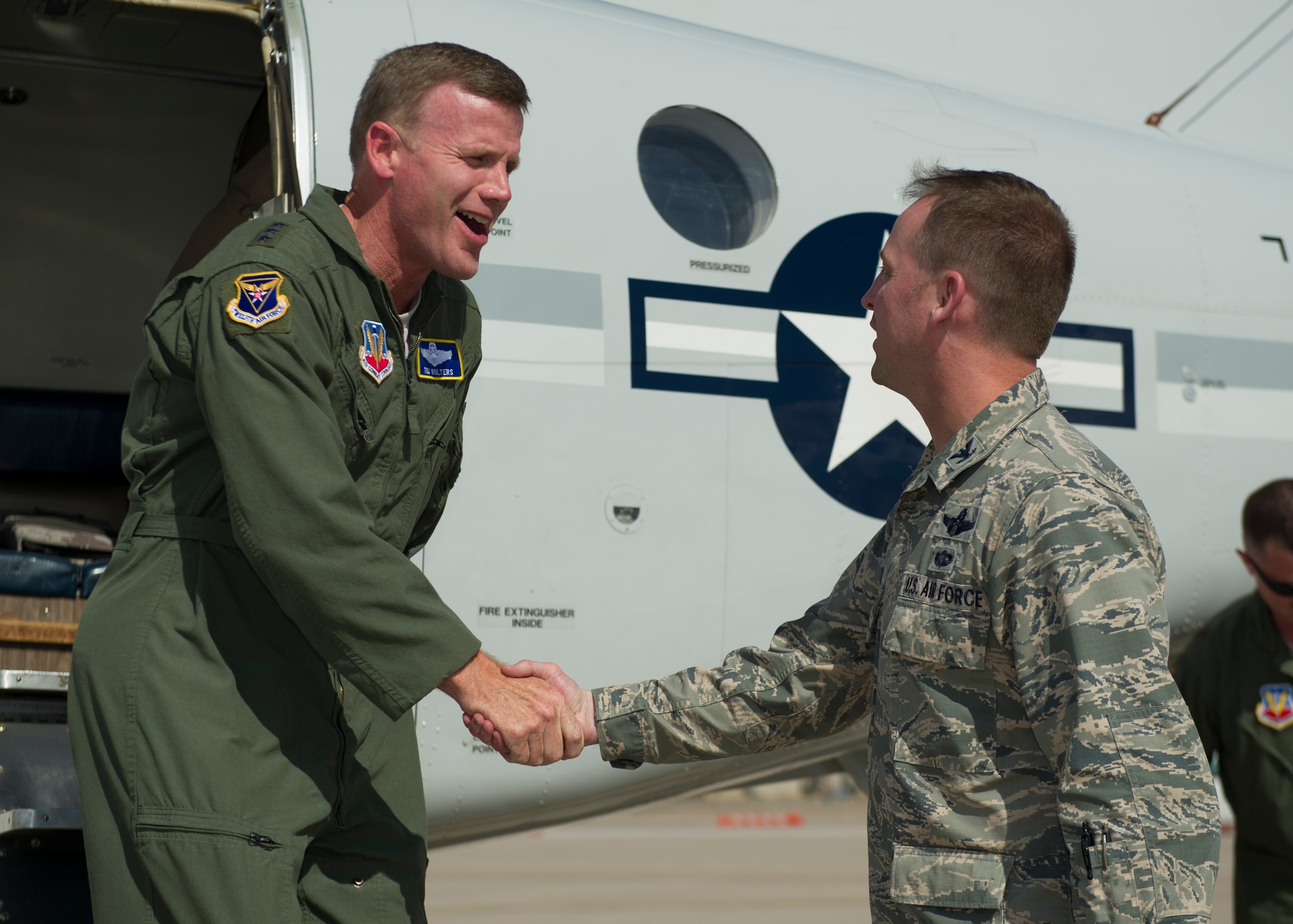 Lieutenant General Tod D. Wolters, 12th Air Force (Air Forces Southern) commander, is greeted by Col. Robert Kiebler, upcoming 49th Wing commander, as he arrives at Holloman Air Force Base, N.M., July 17. Wolters visited Holloman to officiate Kiebler’s assumption of command of the 49th Wing. (U.S. Air Force photo by Airman 1st Class Aaron Montoya / Released)