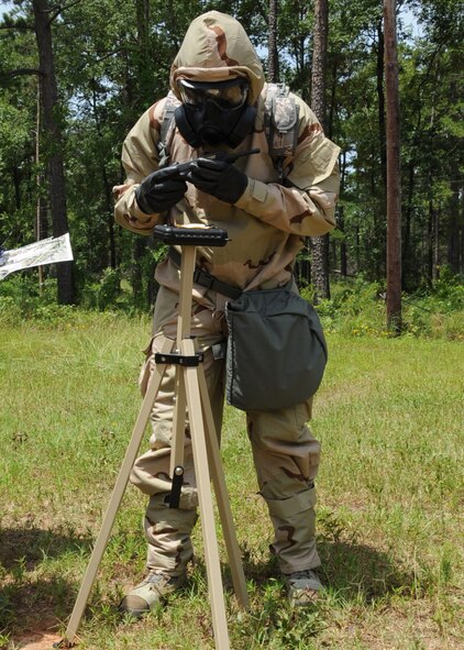 An Airman checks an M-8 stand during an Ability to Survive and Operate Rodeo on Barksdale Air Force Base, La., July 10, 2014. The stand is used to detect chemical agents in the air. (U.S. Air Force photo/Staff Sgt. Sean Martin)