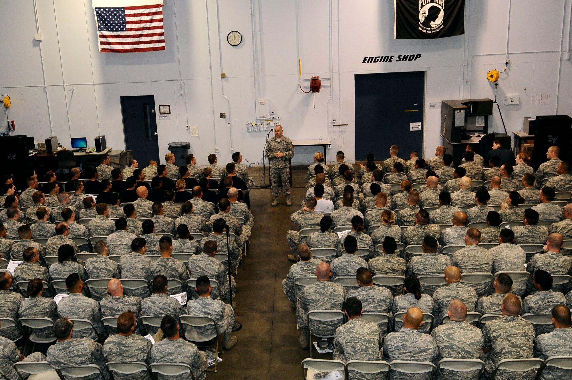 U.S. Air National Guard Command Chief Master Sgt. James Hotaling speaks with 144th Fighter Wing’s junior enlisted Airmen during an all call held at the Fresno Air National Guard Base July 13, 2014. Airmen were given the opportunity to interact with Chief Hotaling and ask him any questions they had about the Air Force and the Air National Guard.  (Air National Guard photo by Airman 1st Class Klynne Pearl Serrano/Released)