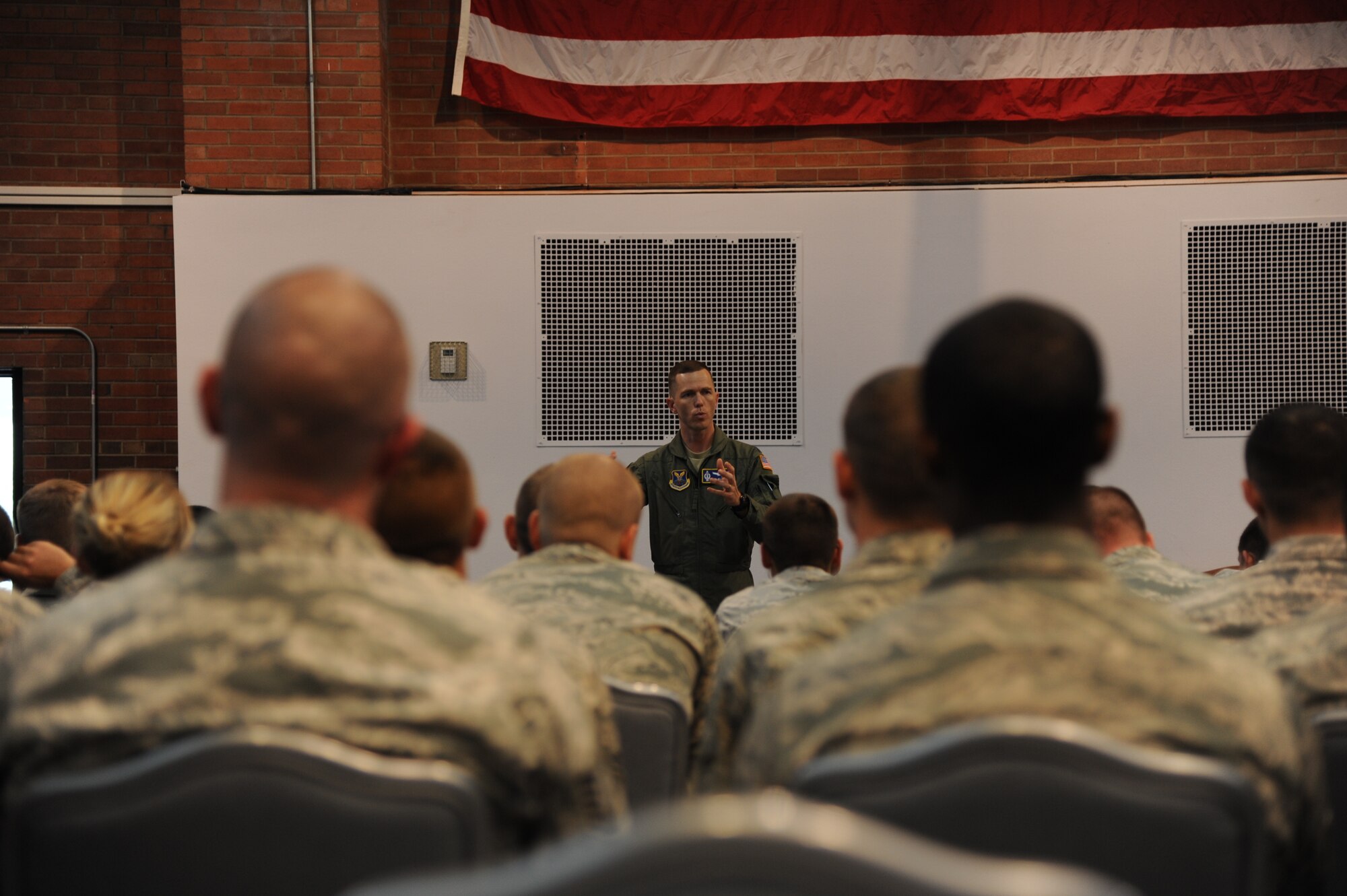 Lt. Col. Russell Williford, AFGSC Force Improvement Program director, addresses security forces members during a Q&A session at F.E. Warren Air Force Base, Wyoming, July 9. Town-hall style discussions like these served to answer questions and provide clarification on the FIP, and were well-received by Airmen across the command.
