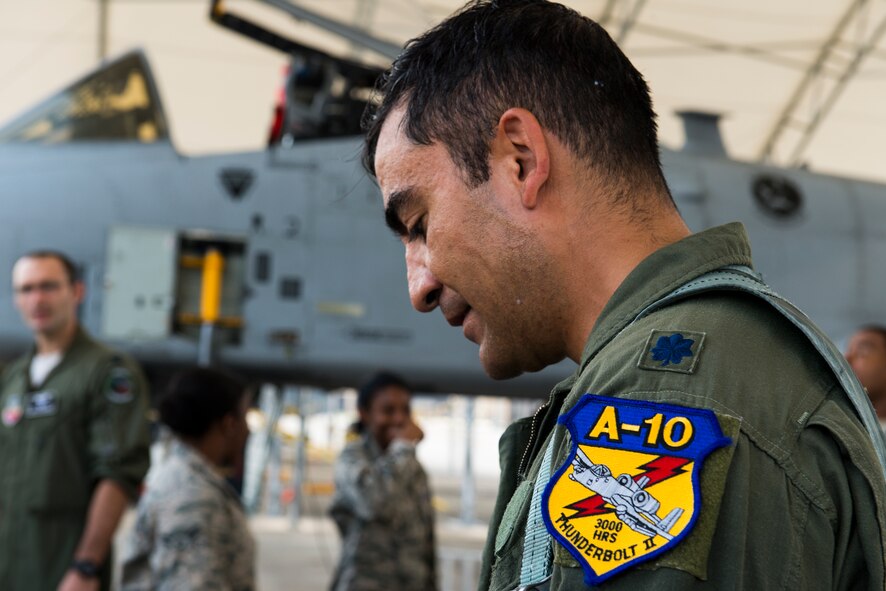 U.S. Air Force Lt. Col. David Rayman, 75th Fighter Squadron commander, displays a new patch signifying he has earned 3,000 hours in an A-10C Thunderbolt II at Moody Air Force Base, Ga., July 17, 2014. Rayman has flown 1,382 total sorties, including 213 total combat sorties. (U.S. Air Force photo by Airman 1st Class Ryan Callaghan/Released)