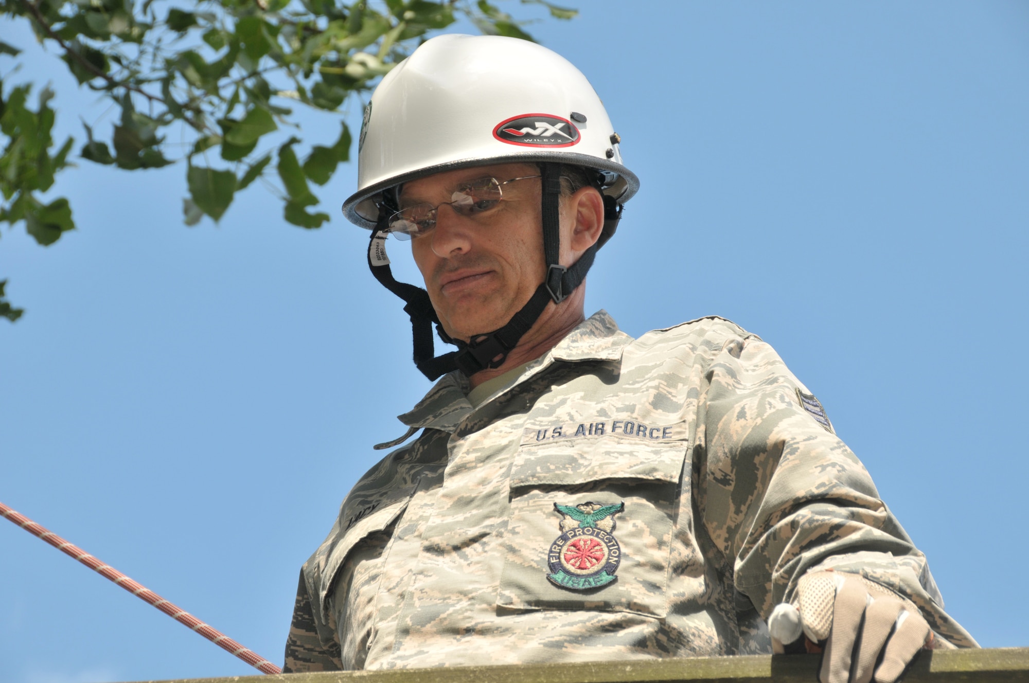 Chief Master Sgt. Ward Lacy, 109th Airlift Wing fire chief, oversees Airmen with the 109th Civil Engineer Squadron's Fire Department complete search and rescue training at Stratton Air National Guard Base, Scotia, New York, on July 17, 2014. Twelve firefighters participated in the training and more will take part in the coming months. The 109th AW rescue team leads a consolidated New York Air National Guard team comprised of personnel from the 106th Rescue Wing, Westhampton Beach, New York, and the 105th AW, Newburgh, New York. The teams are part of the National Guard Bureau's Domestic Operations Concept of Operations, supporting civil authoritiesas part of the National Response Framework. (U.S. Air National Guard photo by Master Sgt. William Gizara/Released)