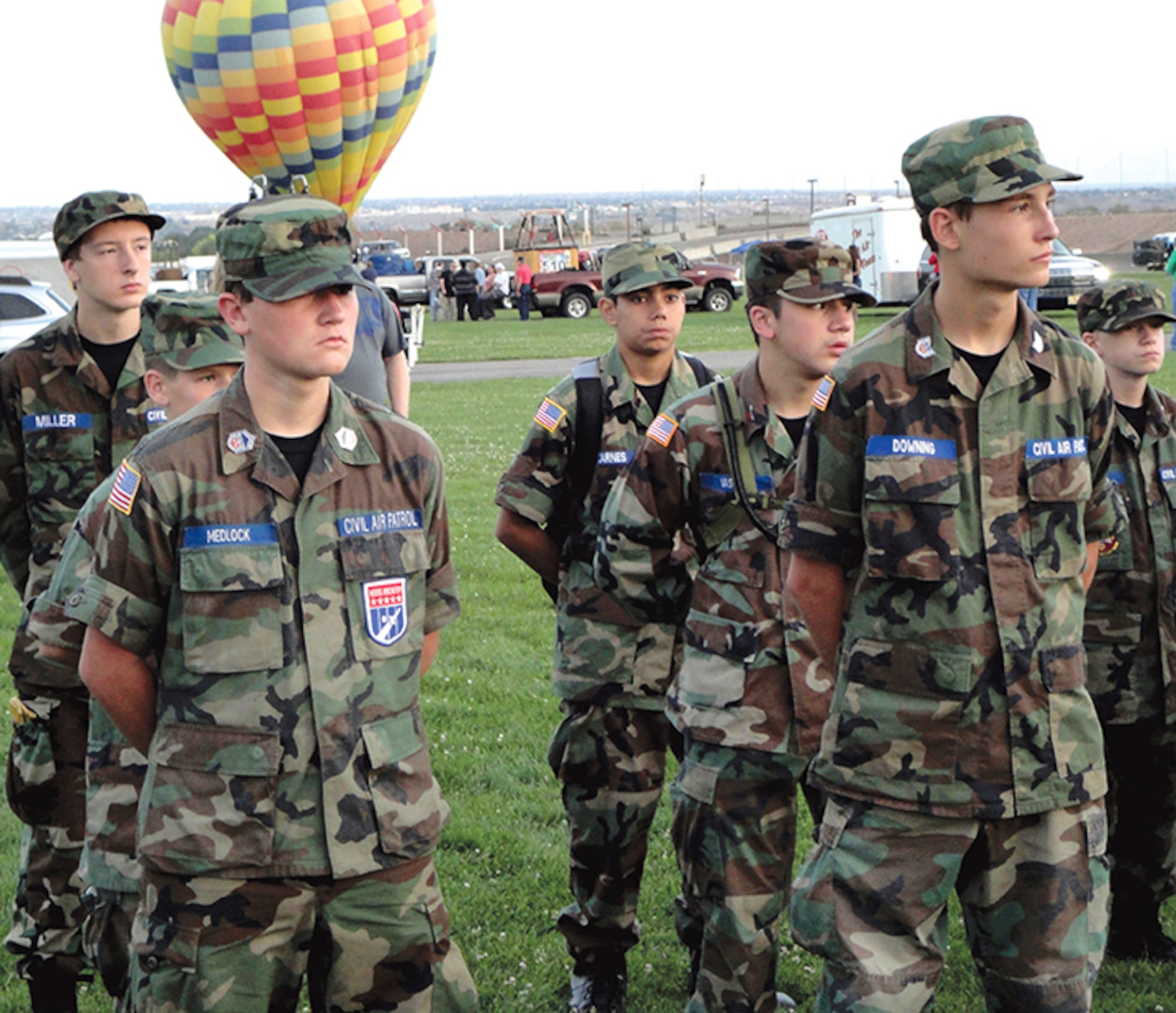 Cadets from the New Mexico Wing of Civil Air Patrol await a briefing before launching hot-air balloons at Albuquerque’s Balloon Fiesta Park on July 13. The New Mexico CAP’s new balloon program allows members to participate in lighter-than-air flight while furthering their aerospace education. (Photo by Lee Ross)