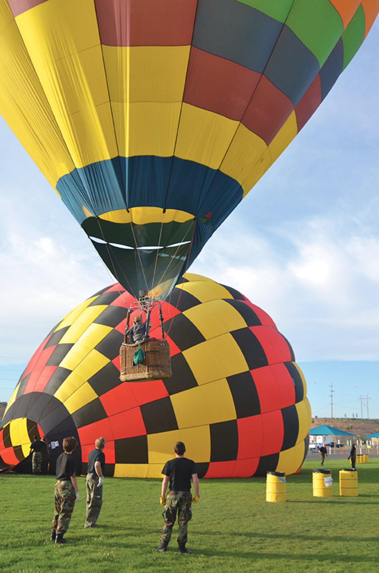 Local Civil Air Patrol cadets and leaders watch a balloon they helped launch. The New Mexico CAP’s new balloon program allows members to participate in lighter-than-air flight while furthering their aerospace education. (Photo by Lee Ross)