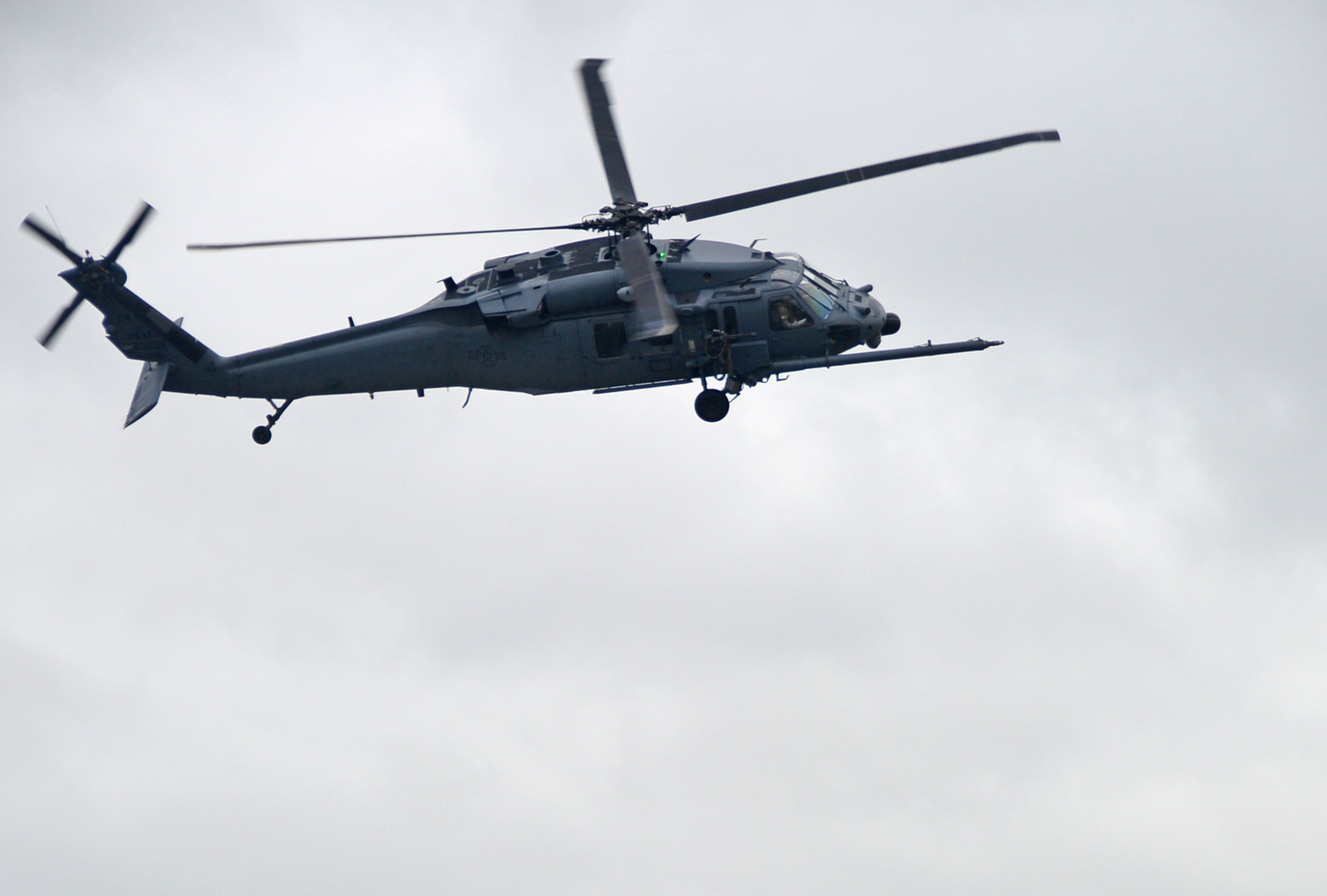An HH-60G Pave Hawk, co-piloted by Col. Kyle Robinson, 48th Fighter Wing commander, prepares to land at Royal Air Force Lakenheath, England, July 10, 2014. Robinson, who has commanded the 48th FW since 2012, was entrusted with the operational readiness, training, morale, welfare, installation support and quality of life of more than 7,000 personnel. (U.S. Air Force photo by Airman 1st Class Erin O’Shea/Released)