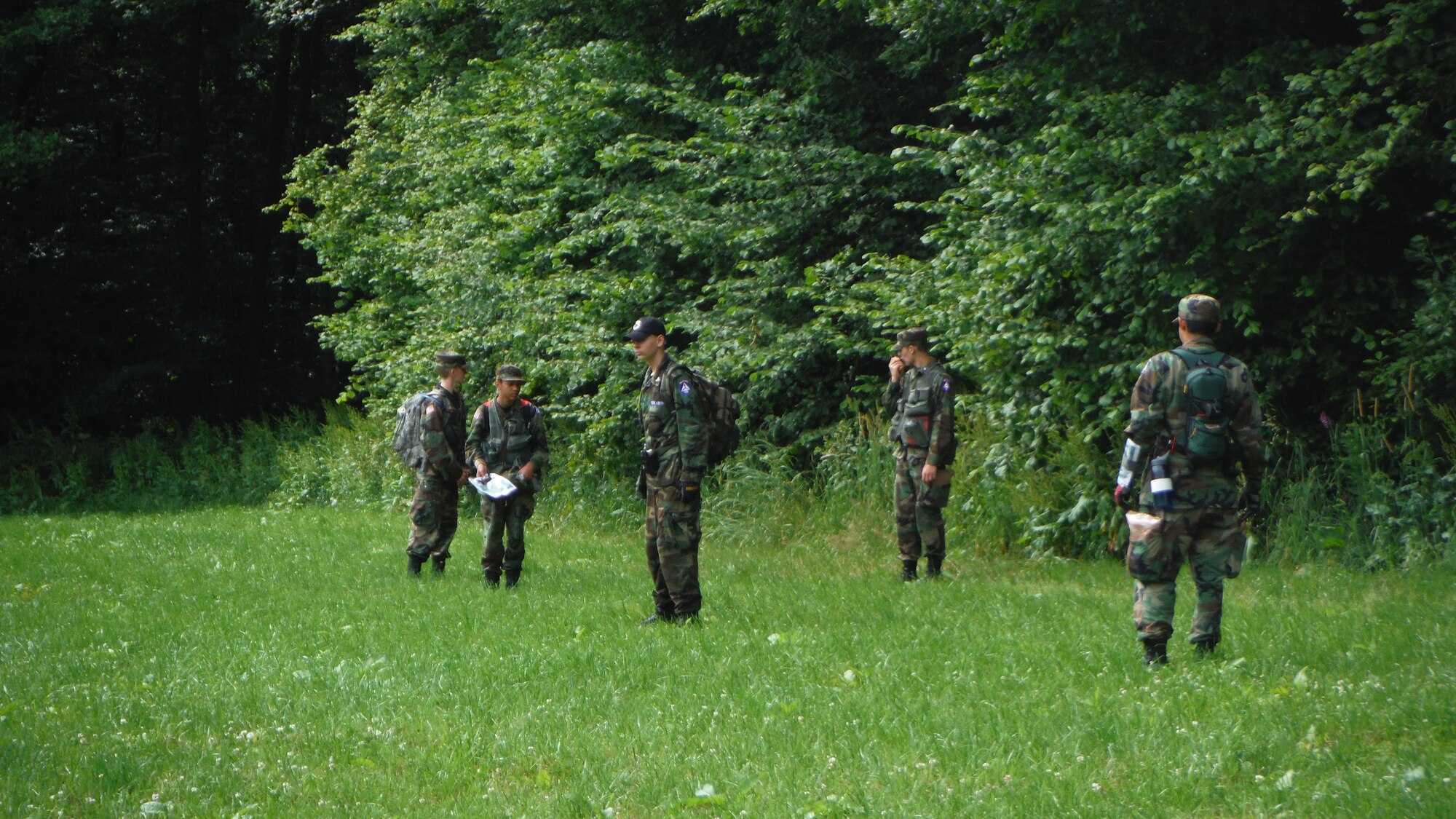 Civil Air Patrol cadets prepare to search a field July 6, 2014, in Luxembourg during a field-training weekend July 4-7. The cadets had completed their search of the forest and proceeded to scan the nearby open field. (U.S. Air Force courtesy photo/Released)