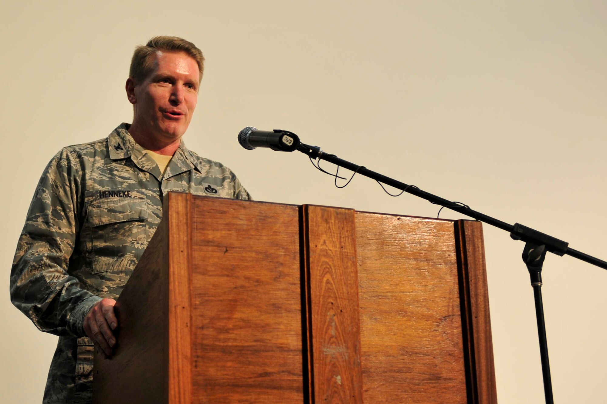 U.S. Air Force Colonel Markus Henneke, 379th Expeditionary Mission Support Group outgoing commander, delivers an introduction speech during the 379th EMSG change of command ceremony Al Udeid Air Base, Qatar, July 13, 2014. The group is the home to the 379th Expeditionary Logistics Readiness Squadron, 379th Expeditionary Communications Squadron, 379th Expeditionary Contracting Squadron, 379th Expeditionary Security Forces Squadron, 379th Expeditionary Civil Engineer Squadron and the 379th Expeditionary Force Support Squadron. (U.S. Air Force photo by Senior Airman Colin Cates)