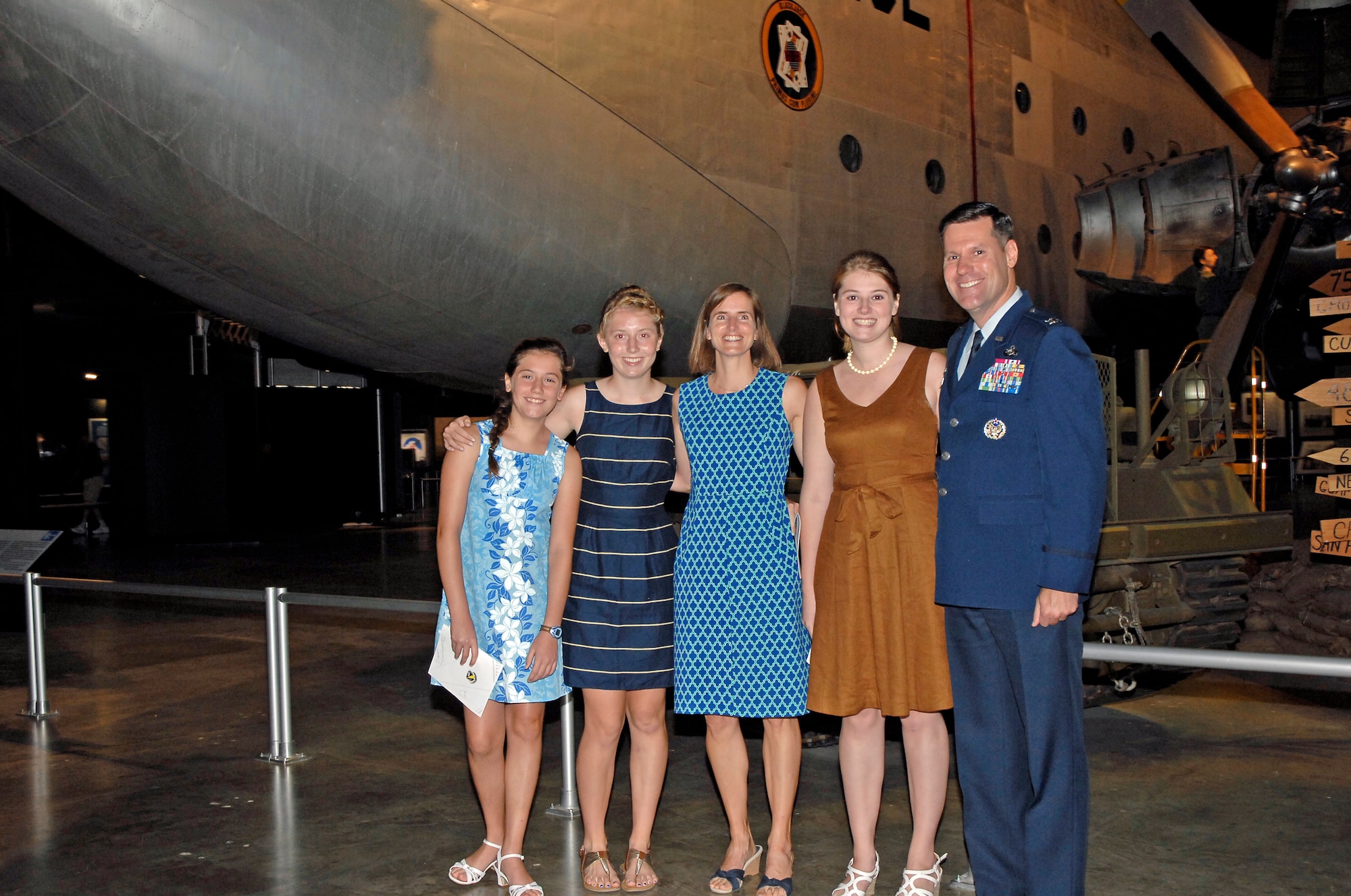 Col. John Devillier's family attended the ceremony at the National Museum of the U.S. Air Force. Left to right are daughters Breana and Amanda, wife Kathryn, and daughter Celina. (Air Force photo by Diane Kofoed)