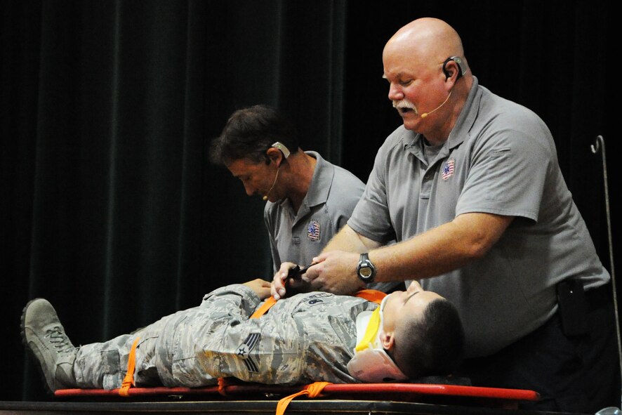 Members from Florida S.A.F.E. (Stay Alive From Education) Inc. simulate the effects of drinking and driving on Senior Airman Anthony Papizzo, 89th Airlift Wing aircraft services specialist, a simulation of what may happen if you drink and drive during the “Street Smart” event on Joint Base Andrews, Maryland, July 15, 2014. The Air Force District of Washington and 11th Wing Safety Offices hosted “Street Smart” to educate Airmen on what could happen if they do not make safe decisions. (U.S. Air Force photo/Staff Sgt. Matt Davis)