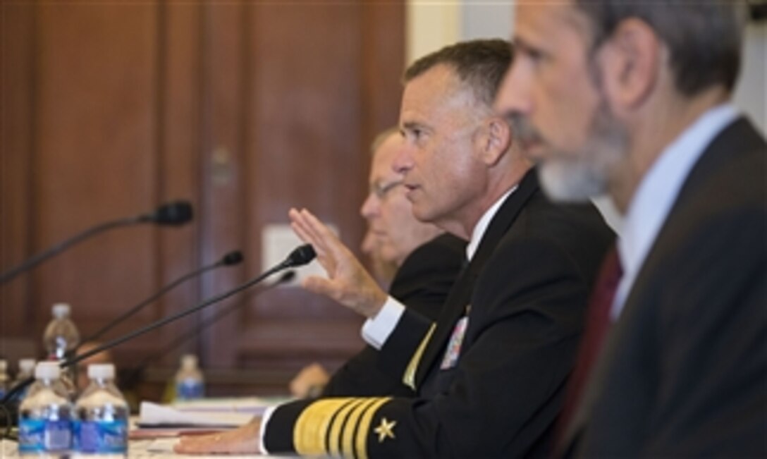 Navy Adm. James A. Winnefeld Jr., vice chairman of the Joint Chiefs of Staff, testifies on the fiscal year 2015 budget request for overseas contingency operations as Deputy Defense Secretary Bob Work, third from right, and Michael J. McCord, far right, the Defense Department's comptroller, look on before the House Budget Committee in Washington, D.C., July 17, 2014.