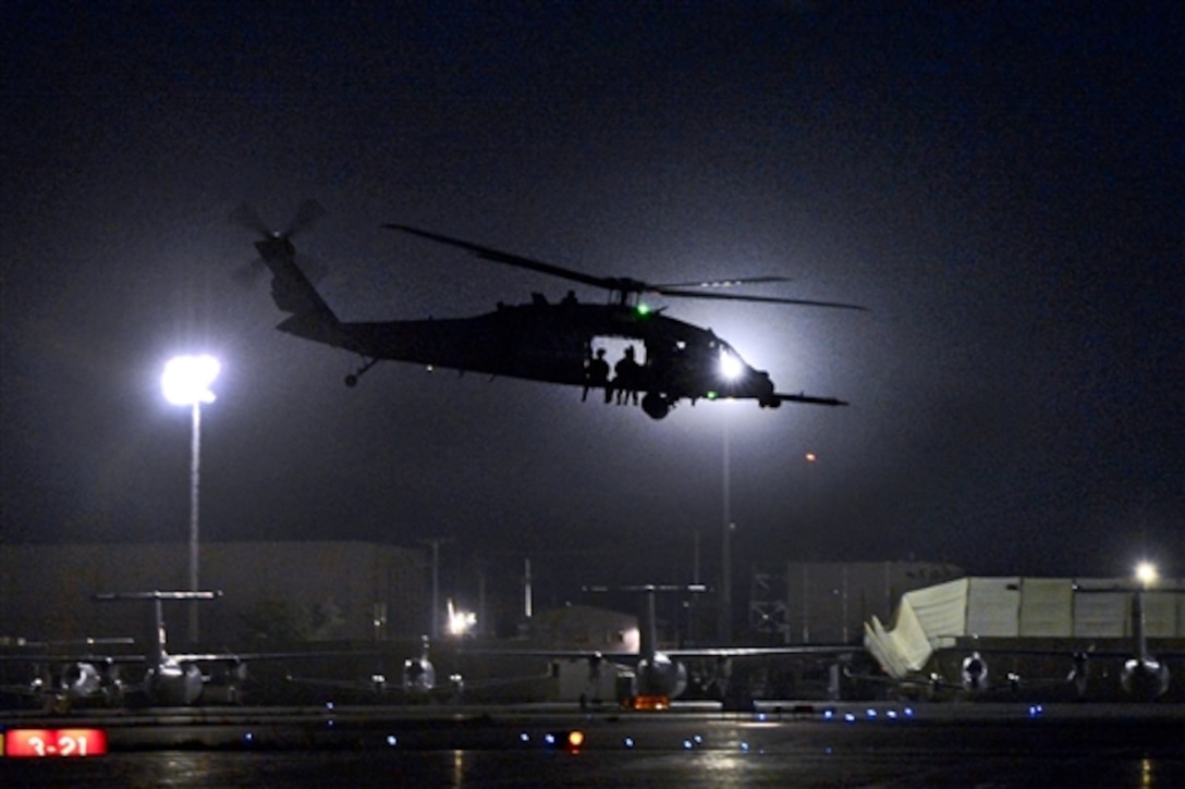 A U.S. Air Force pararescue team takes off in an HH-60G Pave Hawk helicopter from Bagram Airfield Afghanistan, July 9, 2014. The airmen represent U.S. Defense Department elite combat forces specifically  trained, equipped and postured to conduct a range of personnel recovery combat operations. 