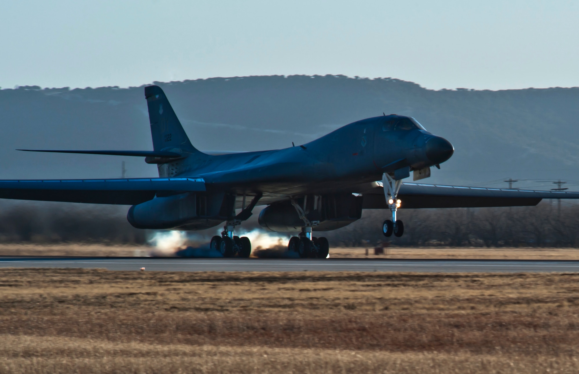 The first newly upgraded operational B1-B Lancer lands Jan. 21, 2014, at Dyess Air Force Base, Texas. The B-1B Lancer was recently upgraded with a new Integrated Battle Station. The new system includes a combination of three different upgrades. One major upgrade incorporates a modern datalink communication network that allows real-time communication with other aircraft, ground stations, and allied forces. The data link also enhances crew awareness of the battle space, and allows for quicker targeting. (U.S. Air Force photo/Staff Sgt. Richard Ebensberger)