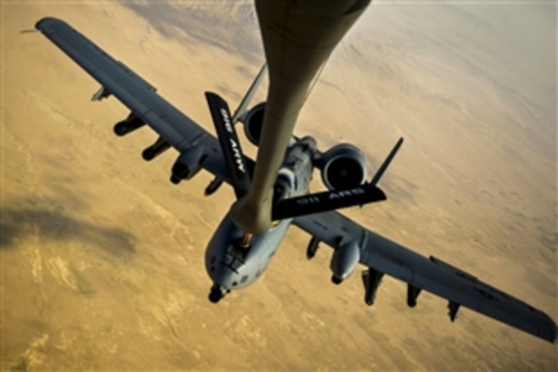 An A-10 Thunderbolt II receives fuel from a KC-135 Stratotanker over eastern Afghanistan, July 10, 2014. The A-10 is assigned to the 303rd Expeditionary Fighter Squadron on Bagram Airfield, Afghanistan, and the KC-135 is assigned to the 340th Expeditionary Air Refueling Squadron on Al Udeid Air Base, Qatar. Its maneuverability at slow speeds and low altitude has made the Thunderbolt II an aircraft choice for close air support throughout Operation Enduring Freedom.