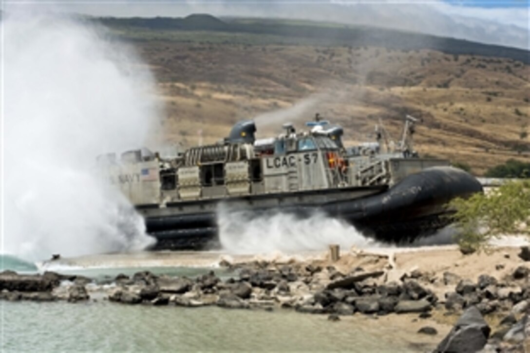 A landing craft air cushion arrives at Kawaihae Harbor, Hawaii, July 17, 2014, during Rim of the Pacific 2014. Twenty-two nations, more than 40 ships and submarines, more than 200 aircraft and 25,000 personnel are participating in the world's largest international maritime exercise. The event provides training to help participants foster the cooperative relationships critical to ensuring the safety of sea lanes and security on the world's oceans.
