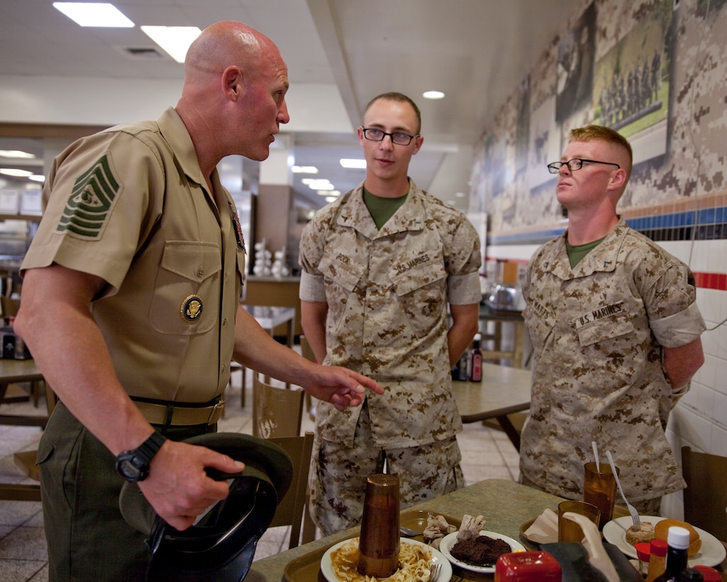 Sgt. Maj. Micheal P. Barrett, the 17th Sergeant Major of the Marine Corps, talks with recruits in the chow hall at Marine Corps Recruit Depot San Diego, San Diego, Calif., on July 17, 2014. (U.S. Marine Corps photo by Lance Cpl. Samantha K. Draughon/ Released) 