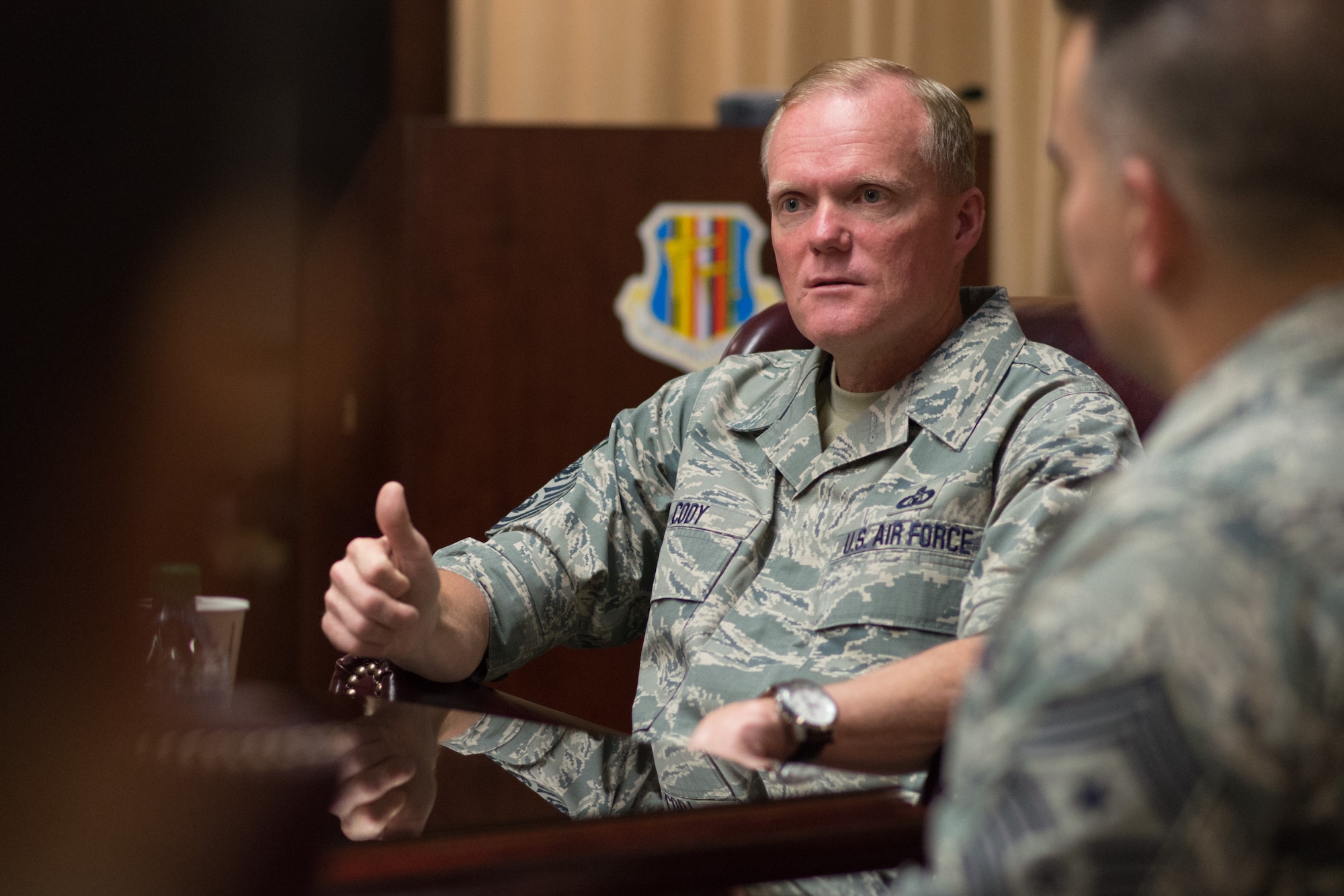 Chief Master Sgt. of the Air Force James A. Cody speaks with Airmen during a meeting July 10, 2014, on Travis Air Force Base, Calif. During his three-day visit, Cody discussed the future of the Air Force and force management challenges with Travis AFB Airmen. (U.S. Air Force photo/Ken Wright) 
