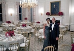 President Barack Obama and First Lady Michelle Obama pose in the State Dining Room of the White House before the Governors dinner, Feb. 22, 2009.