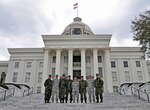 Alabama National Guard Soldiers and members of the Romanian Land Force pose in front of the Alabama Capitol building in Montgomery, Ala., Feb. 22, 2012. The Alabama National Guard and Romania have been partners for 19 years through the National Guard's State Partnership Program.