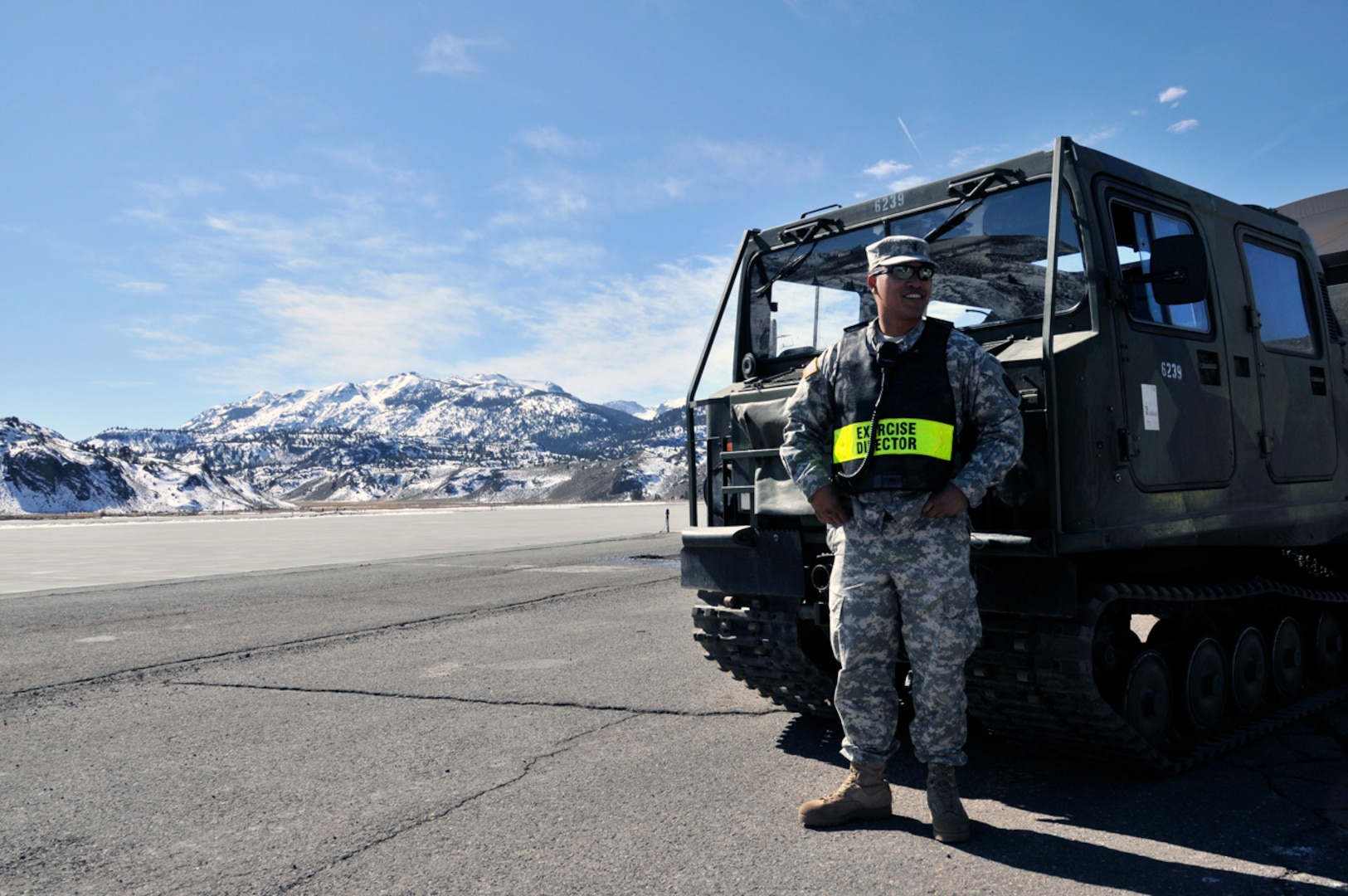 Army National Guard 1st Lt. Edward Baon, the 95th Civil Support Team medical operations officer and exercise Operation Red Snow director, leans on a Bandvagn, an all-terrain vehicle, at the Marine Corps Mountain Warfare Training Center about 20 miles northwest of Bridgeport, Calif. Nearly 100 California Air and Army National Guard members conducted cold weather training here Feb. 13-17, 2012 as part of Operation Red Snow.