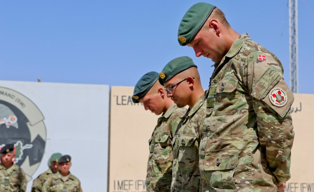 Danish soldiers, with the Danish Contingent International Security Assistance Force 17 (DANCON ISAF-17) to Afghanistan, participate in the Danish Flag Lowering ceremony aboard Camp Leatherneck, Helmand province, Afghanistan, July 21, 2014. The lowering of the Danish Flag over Camp Leatherneck formally concludes the country's participation in Regional Command (Southwest).
(Official U.S. Marine Corps photo by Sgt. James D. Pauly, Marine Expeditionary Brigade Afghanistan/Released)