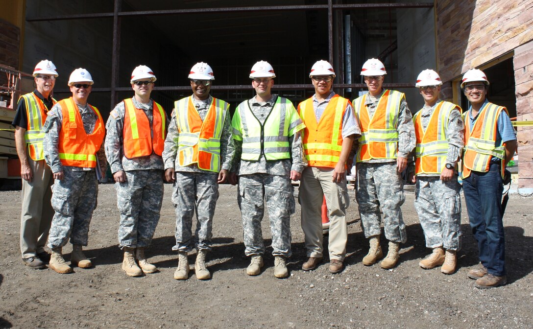 Chief of Engineers Lt. Gen. Thomas P. Bostick (fourth from left), and senior Corps of Engineers and U.S. Army Pacific (USARPAC) leaders toured and were briefed on the construction status of the USARPAC Mission Command Facility (MCF) at Fort Shafter on 17 July, the same day Lt. Col. Chris Crary (center) became the new Honolulu District Commander. The MFC, which the Corps is building for USARPAC, will consolidate USARPAC Headquarters into one facility that will support Mission Command of Army or joint forces across the Asia-Pacific Area of Operations. Photo by Joseph Bonfiglio