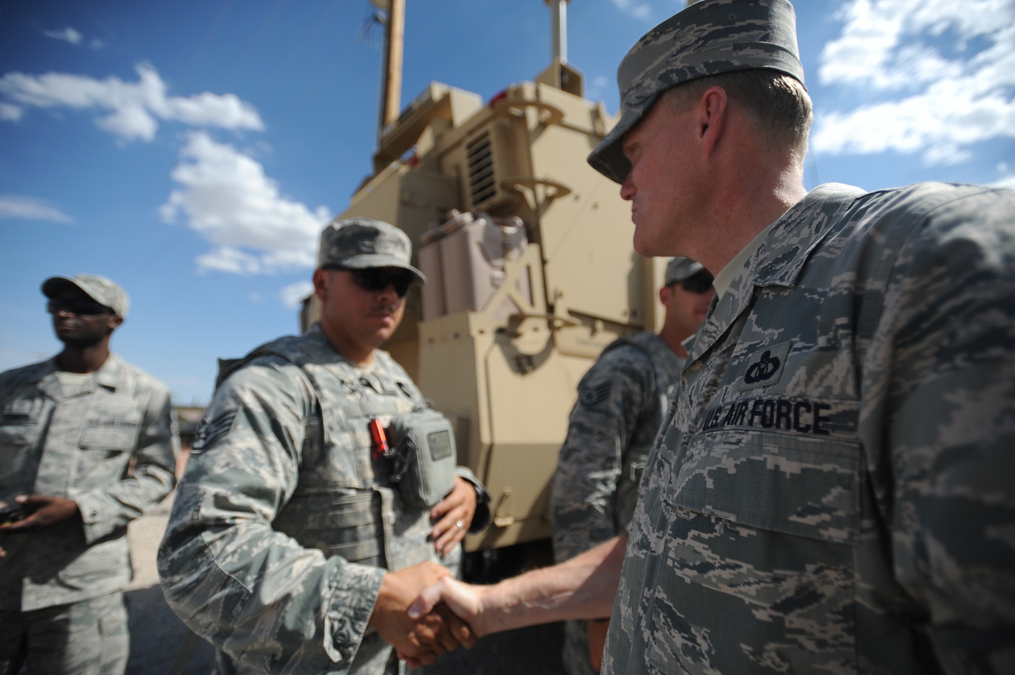 Chief Master Sgt. of the Air Force James Cody thanks security forces Airmen for their service during his visit to the 99th Ground Combat Training Squadron at Creech Air Force Base, Nev., July 16, 2014. During his first visit to Creech AFB, Cody saw firsthand the operations tempo of the base’s Airmen with a fully packed itinerary that included several stops to workcenters as well as an Airman’s Call, where he shared some of the latest Air Force challenges. (U.S. Air Force photo by Tech. Sgt. Nadine Barclay/RELEASED)