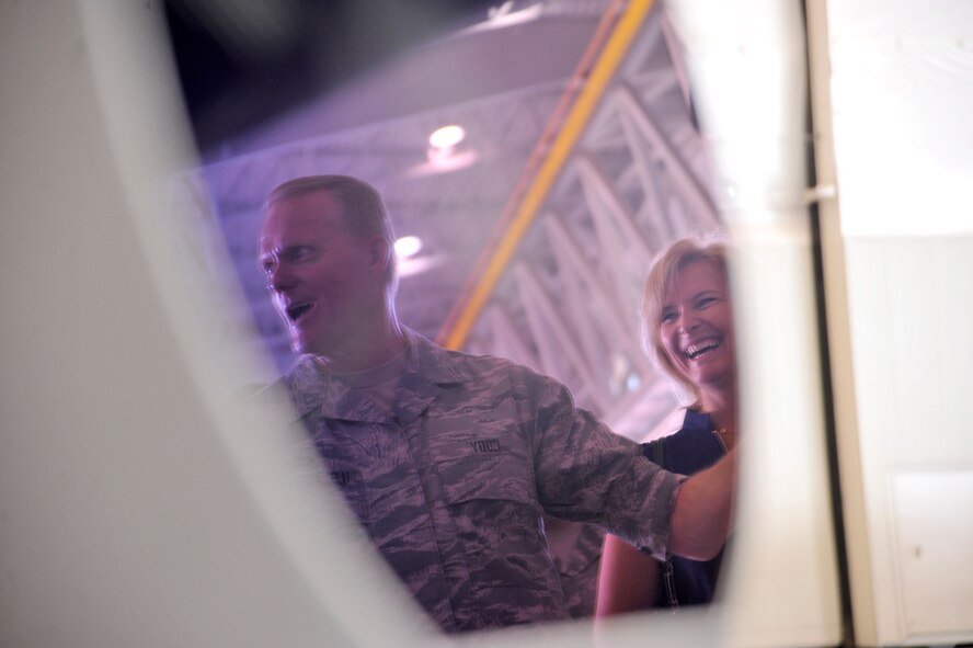 Chief Master Sgt. of the Air Force James Cody and his wife retired Chief Master Sgt. Athena Cody, laugh during their visit with Airmen of the 432nd Wing/432nd Air Expeditionary Wing and 799th Air Base Group as they shared their units’ missions and objectives July 15-16, during the Codys’ first visit to Creech Air Force Base, Nev. During the visit, the Codys’ saw firsthand the operations tempo of the base’s Airmen.  Everyday Creech Airmen fulfill their mission by providing intelligence, surveillance and reconnaissance, maintenance, base support and defense, and other capabilities in support of combatant commanders around the globe.  (U.S. Air Force photo by Airman 1st Class Christian Clausen/RELEASED)