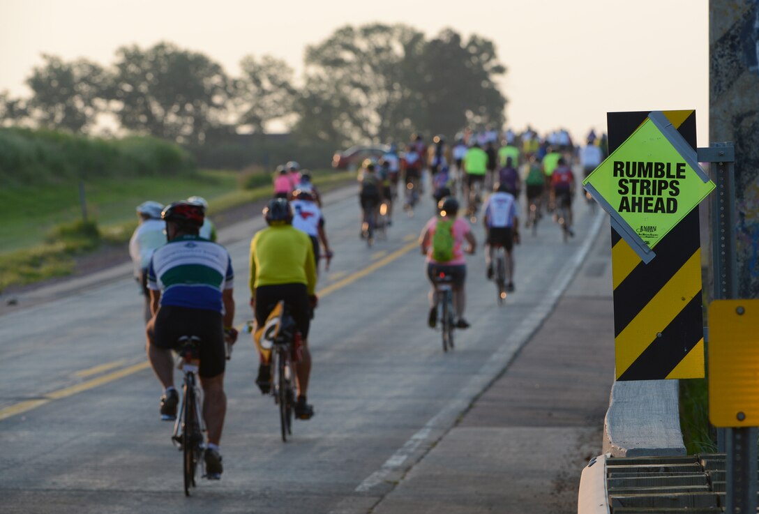 Not needing any additional aggravation on their backside, riders are warned of upcoming rumble strips on the road during Iowa’s RAGBRAI bicycling event on July 20, 2014.  The Registers Annual Great Bike Ride Across Iowa is a weeklong bicycling touring event that attracts riders from around the world to ride across the Hawkeye state each July.
U.S Air Guard Photo by Master Sgt. Vincent De Groot/ released