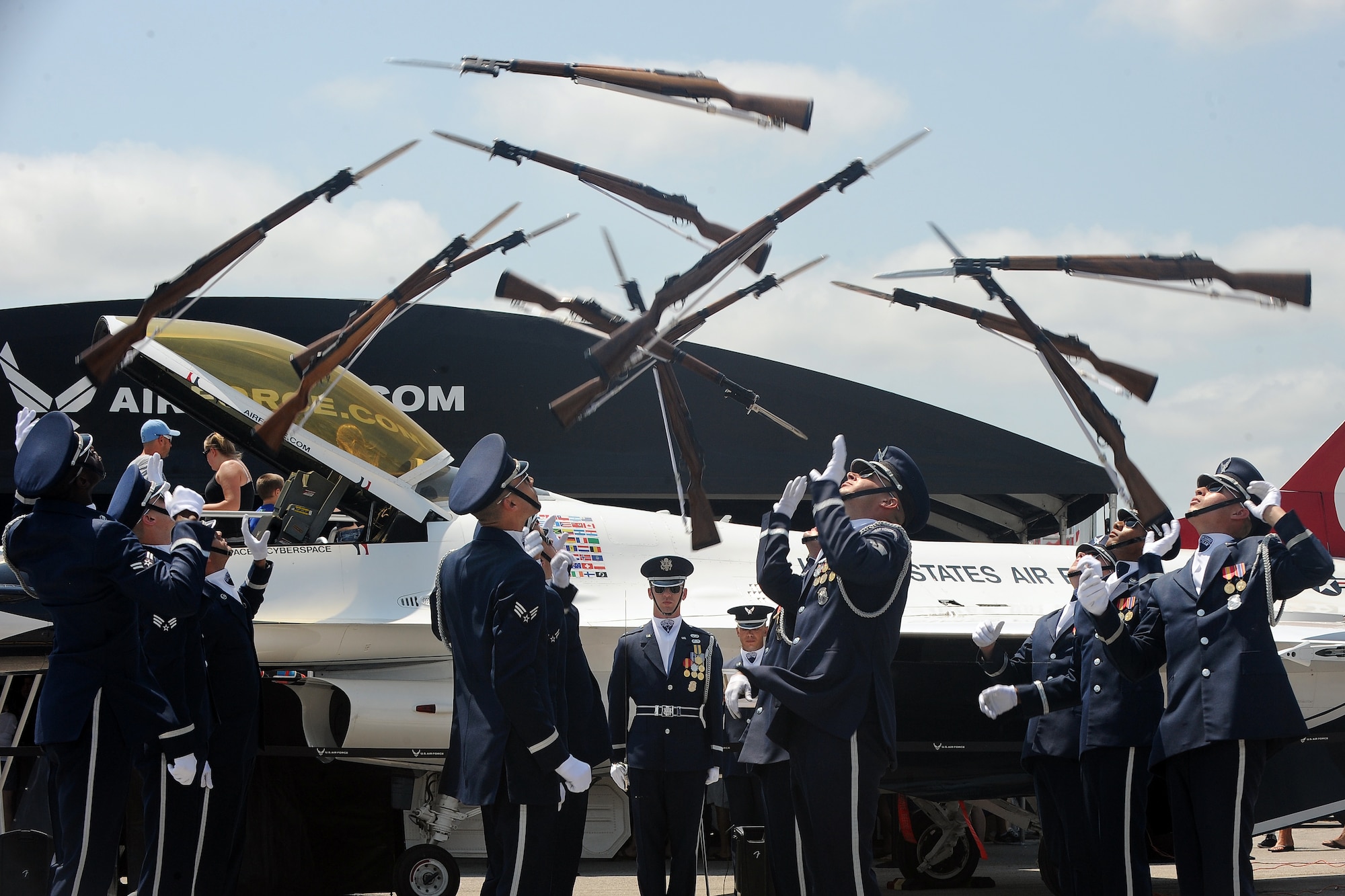 The United States Air Force Honor Guard promoted the Air Force mission by showcasing drill performances during the 2014 Defenders of Freedom Open House and Air Show July 20 at Offutt Air Force Base, Neb.  The Drill Team support Air Force Recruiting Service as the official Ambassadors in Blue. (U.S. Air Force photo by Josh Plueger/Released)