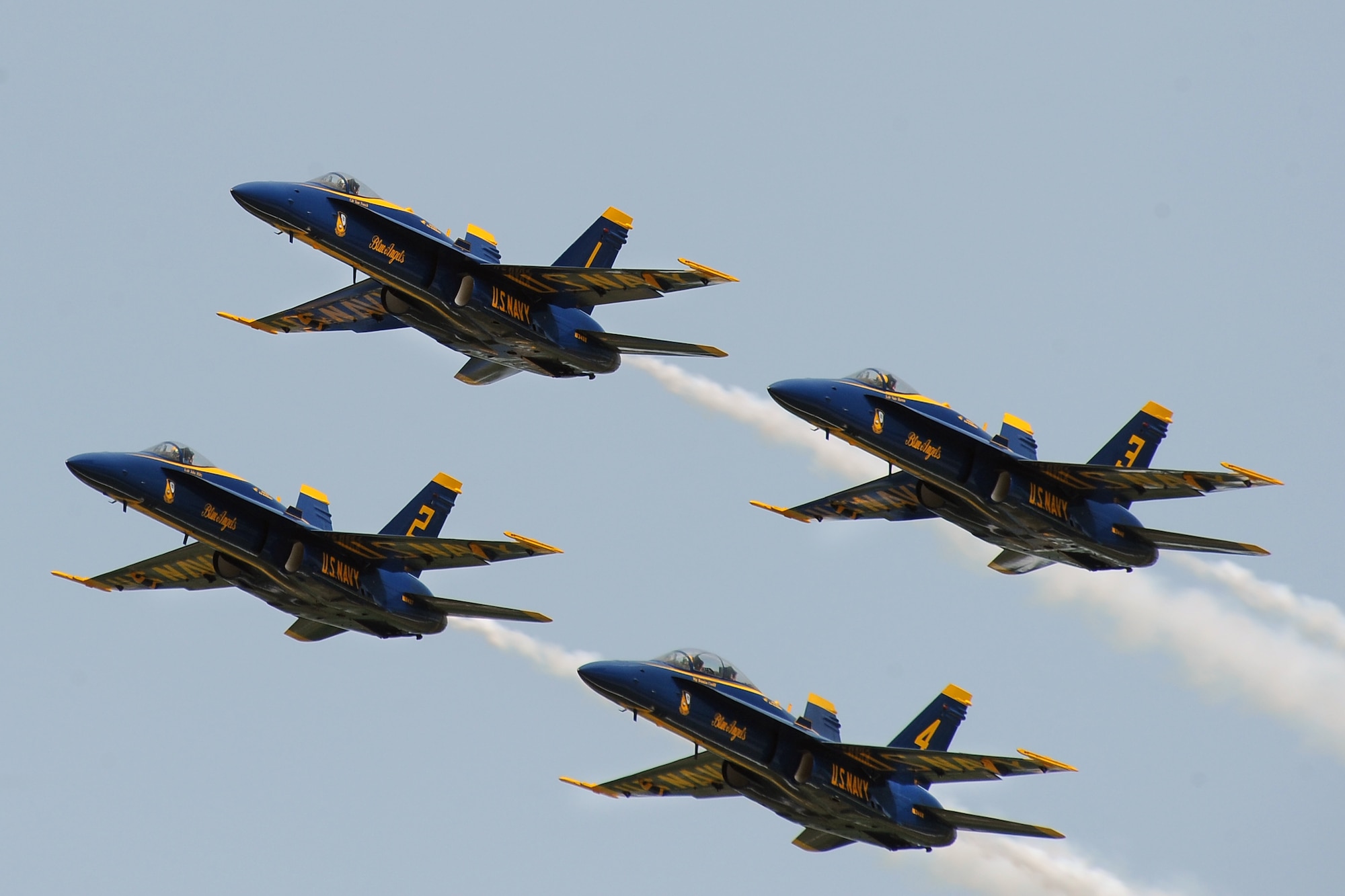 The U.S. Navy Blue Angels pass show center in their iconic “diamond formation” while performing at the 2014 Defenders of Freedom Open House and Air Show held at Offutt Air Force Base, Nebraska July 19.  The Blue Angels last performed at Offutt at the 2009 air show.  (U.S. Air Force photo by Josh Plueger/Released)