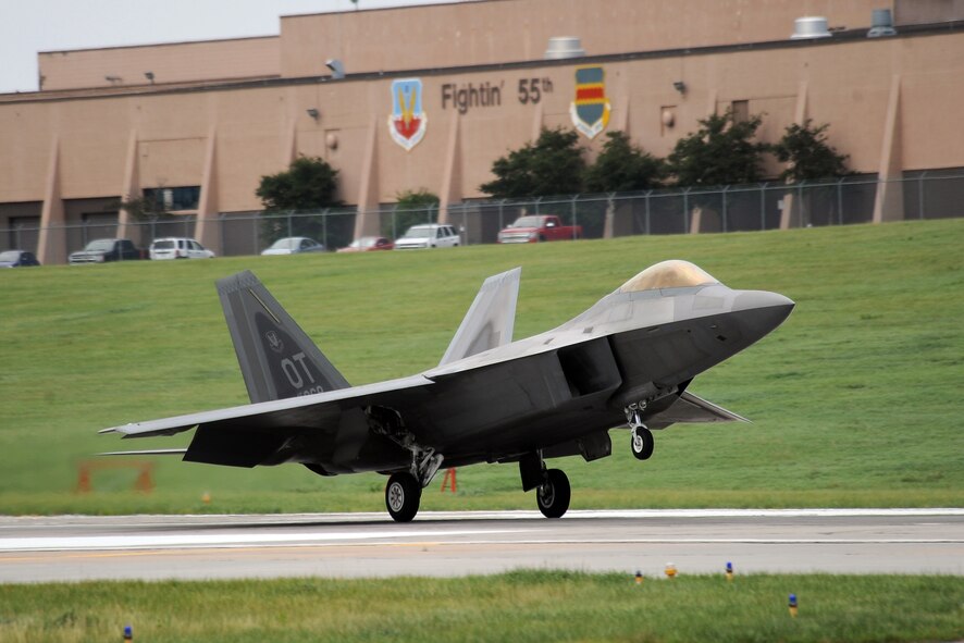 An F-22 Raptor with the F-22 Demo Team, lands on the Offutt Air Force Base, Nebraska runway following its performance at the 2014 Defenders of Freedom Open House and Air Show July 19.  The open house attracted record numbers of people from around the Omaha-metro area.  (U.S. Air Force photo by Josh Plueger/Released)