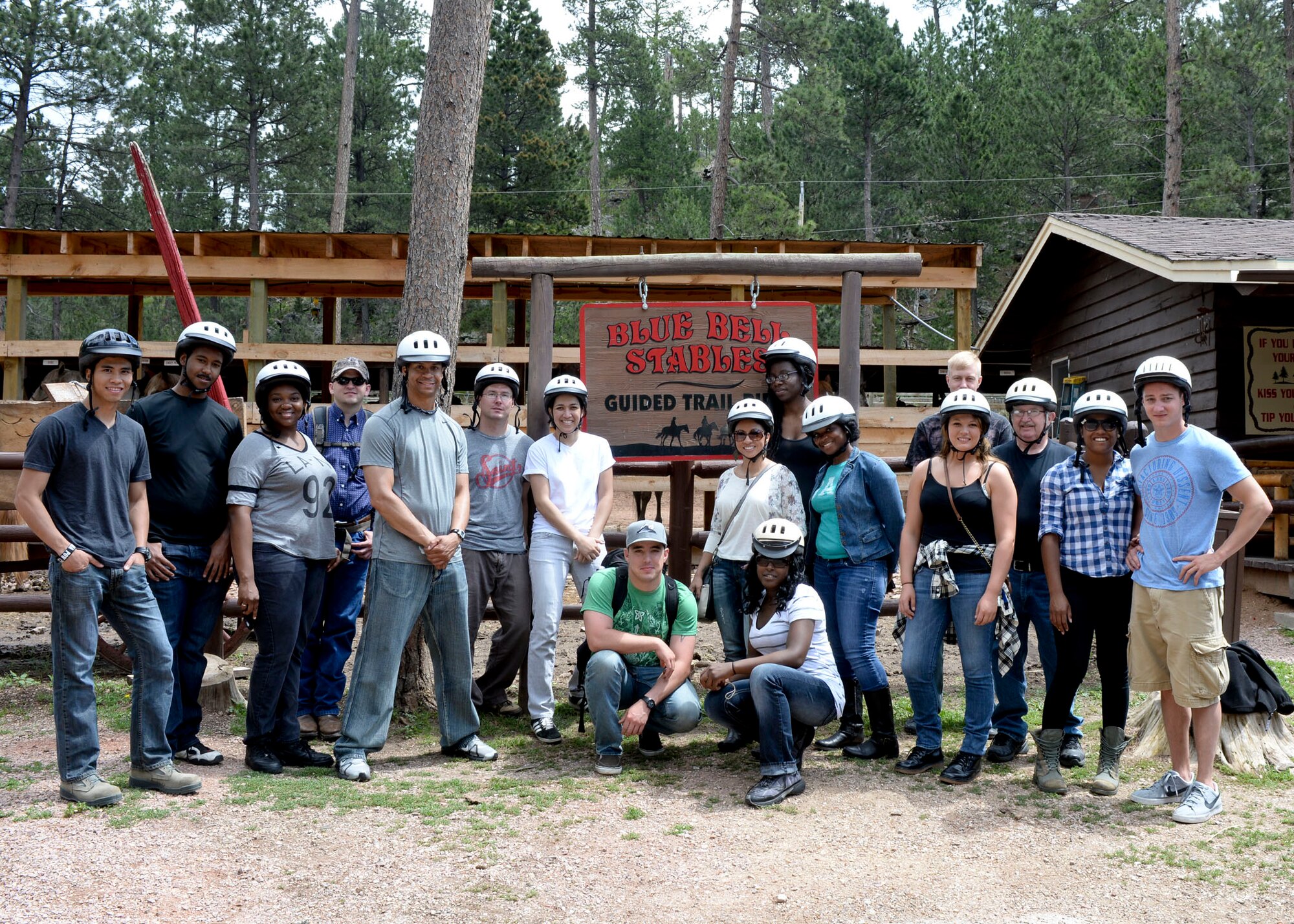 Ellsworth Airmen pose for a group photo after participating in a trail ride through Custer State Park, S.D. The 28th Force Support Squadron outdoor recreation staff sponsored the event to provide Airmen the opportunity to experience South Dakota’s outdoors.  (U.S. Air Force photo by Senior Airman Anania Tekurio/Released)