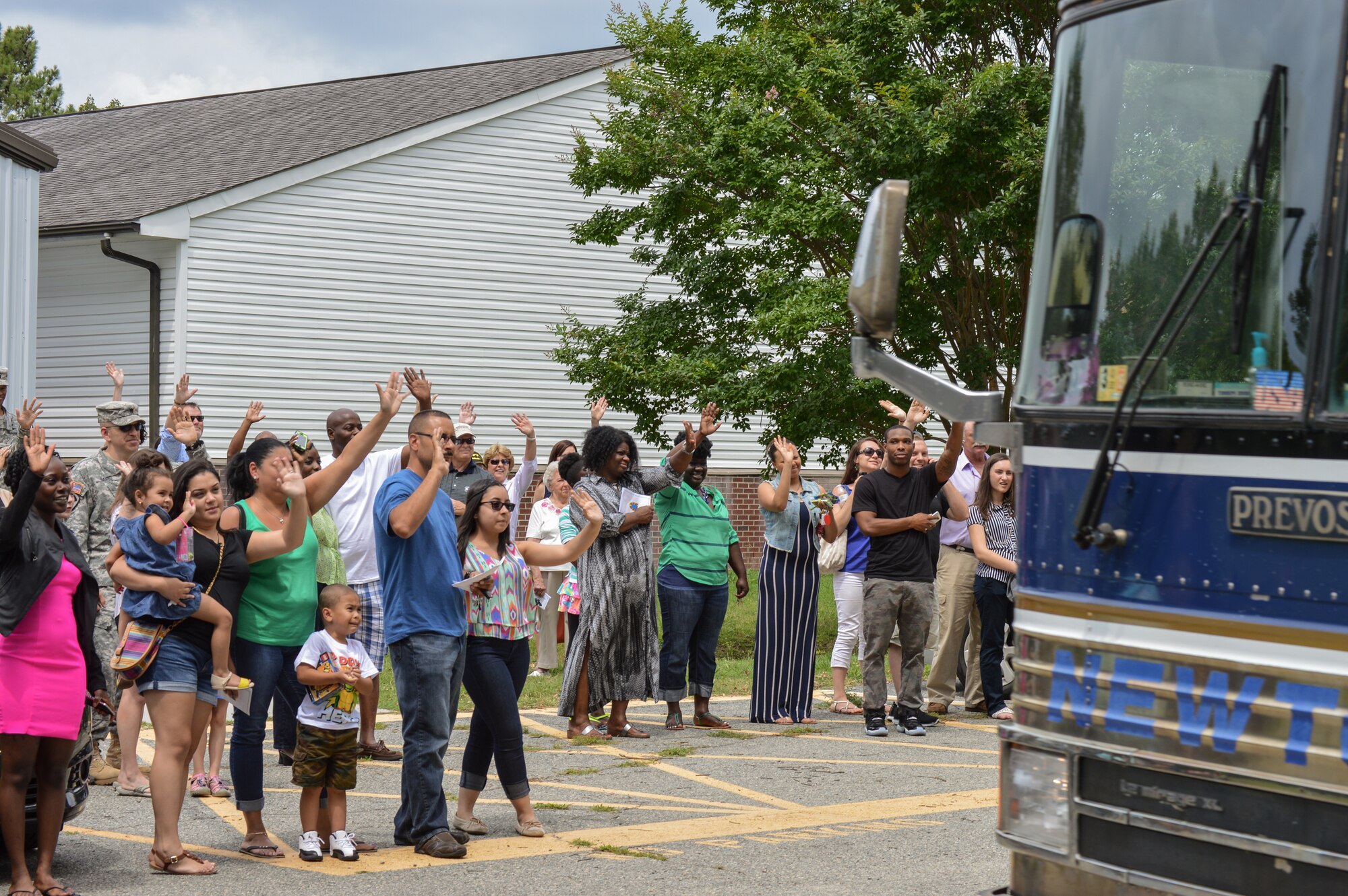 U.S. Army Soldiers, families and friends bid farewell to the 612th Movement Control Team, 53rd Transportation Battalion, 7th Transportation Brigade (Expeditionary), after a deployment ceremony at Fort Eustis, Va., July 19, 2014. The team deployed to Afghanistan in support of Operation Enduring Freedom. (U.S. Army photo by Spc. Marian Alleva/Released)