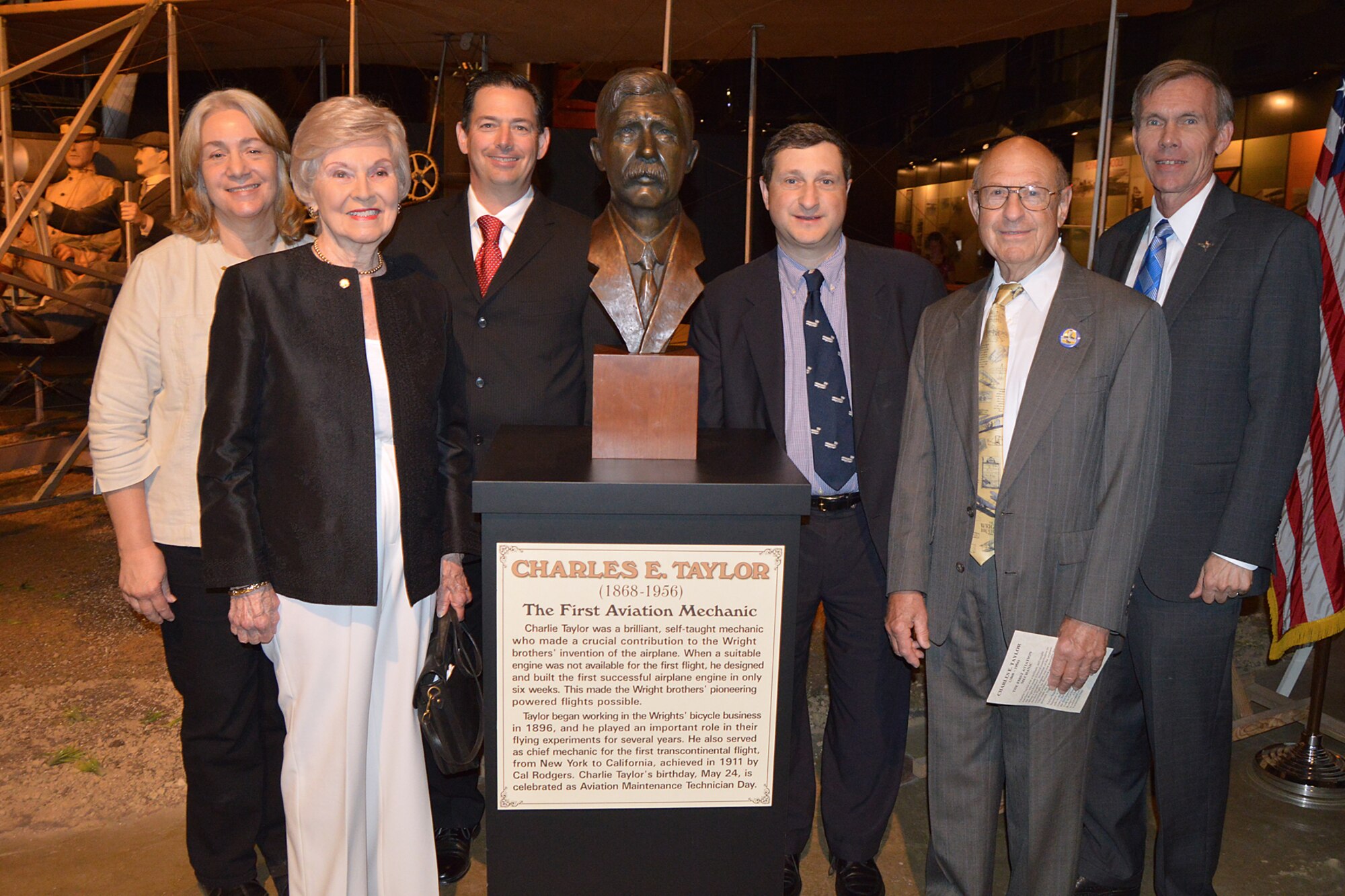DAYTON, Ohio - Distinguished guests, community and National Museum of the U.S. Air Force officials unveiled a bronze bust honoring the first aviation mechanic, Charles E. Taylor. 

From left to right: Dawne Dewey, Head, Special Collections and Archives and Director, Public History at Wright State University; Virginia Hess, artist and creator of the bust; Ken MacTiernan, Founder, Aircraft Maintenance Technicians Association, which donated the bust; Charles Taylor II, great-grandson of Charles E. Taylor; Reuben Taylor, grandson of Charles E. Taylor; and Museum Director Lt. Gen. (Ret.) Jack Hudson. (U.S. Air Force photo by Ken LaRock)