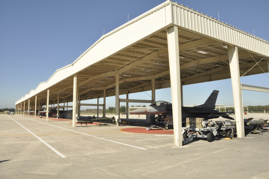 Sunshades protect Airmen and aircraft from elements at Homestead Air Reserve
Base, Florida. The sunshades are a product of making every dollar count;
they were purchased at the lowest cost possible without reducing quality of
the product. (U.S. Air Force photo/Senior Airman Nicholas Caceres)
