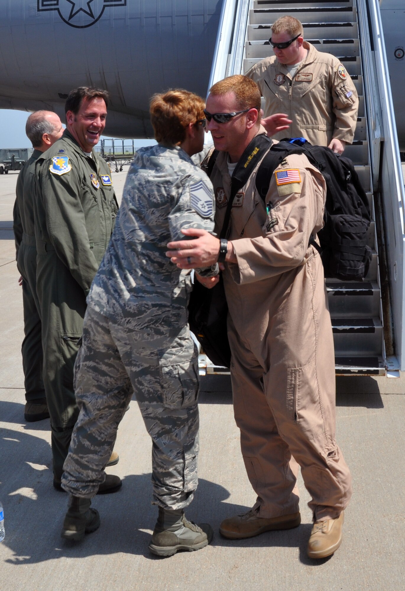 Members of the Air Force Reserve 931st Air Refueling Group are welcomed home to McConnell Air Force Base, Kan., July 21, 2014.  The Citizen Airmen had served a 60-day deployment to Al Udeid Air Base, Qatar, as part of the 379th Air Expeditionary Wing.  (U.S. Air Force photo by Capt. Zach Anderson)      