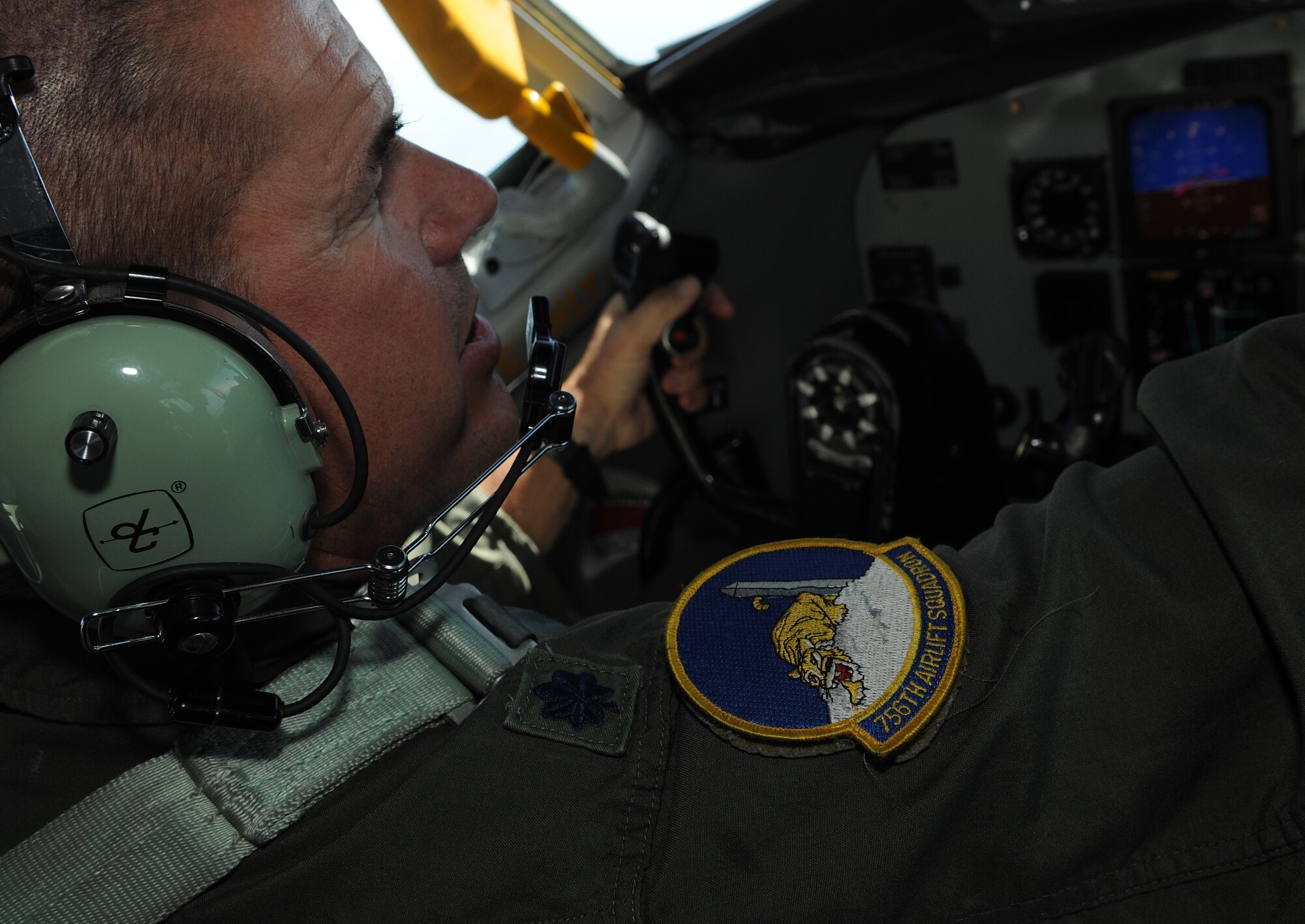 Lt. Col. Kirk Chestnut pilots a KC-135 Stratotanker over Virginia while assisting a new co- pilot, Capt. John Meixell, July 18, 2014. Chestnut and Meixell are both pilots with the 756th Airlift Squadron. This was Meixell’s first flight since graduating technical training. (U.S. Air Force photo/ Senior Airman Nesha Humes)