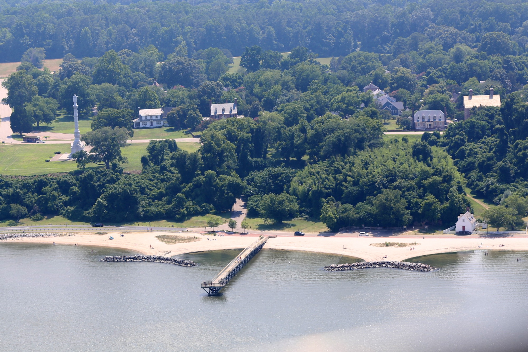 A CH-47D Chinook attached to 5-159th General Support Aviation Battalion, 244th Aviation Brigade, flies by the Yorktown Victory Monument and surrounding beaches during a vision recognition training flight out of Fort Eustis, Va., July 8, 2014. A vision recognition training flight is a flight where the pilot uses landmarks, roads and waterways to navigate the helicopter.  The 5-159th GSAB is a part of Task Force Aviation, a component of Joint Task Force Civil Support. Task Force Aviation’s mission, the only aviation brigade in the Army Reserves, provides command and control of aviation assets to support JTF-CS. JTF-CS anticipates, plans and prepares for chemical, biological, radiological and nuclear defense support to civil authorities response operations. (DOD photo by U.S. Marine Corps Gunnery Sgt. Helen Searcy/Released)