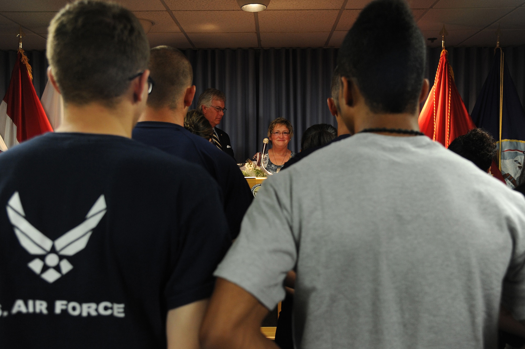 Sherry Wyatt expresses her gratitude to the attendees of the dedication ceremony at the St. Louis Military Entrance Processing Station in St. Louis, MO, July 17, 2014. Twelve soon to be service members were sworn in to christen the room. (U.S. Air Force photo/Senior Airman Tristin English)