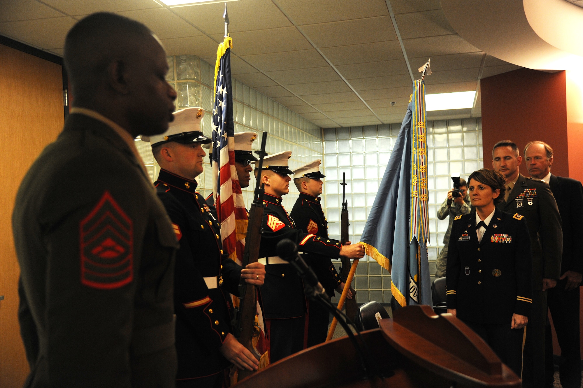 Members of a Marine Honor Guard detail post the colors at the  U.S Army Specialist Sterling Wyatt dedication ceremony at the St. Louis Military Entrance Processing Station in St. Louis, MO, July 17, 2014. Sterling Wyatt was killed in action when his vehicle was attacked with an enemy improvised explosive device. Wyatt received the Medal of Valor,Combat Infantry Badge and the Bronze Star. (U.S. Air Force photo/Senior Airman Tristin English)