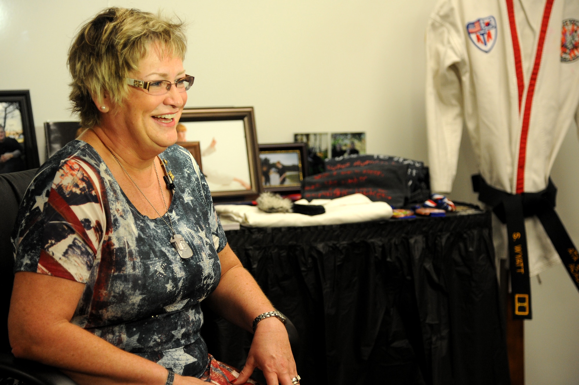 Sherry Wyatt, the mother of U.S Army Specialist Sterling Wyatt, talks about the accomplishments of her son during the dedication ceremony at the St. Louis Military Entrance Processing Station in St. Louis, MO, July 17, 2014. Sterling Wyatt was killed in action when his vehicle was attacked with an enemy improvised explosive device while on patrol in Kandahar Province Afghanistan July 11, 2011. (U.S. Air Force photo/Senior Airman Tristin English)