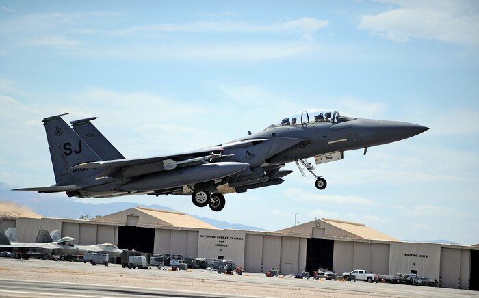 An F-15E Strike Eagle assigned to the 4th Fighter Wing, Seymour Johnson Air Force Base, N.C., takes off during Red Flag 14-3 at Nellis Air Force Base, Nev., July 15, 2014. Red Flag is a realistic combat training exercise involving the air, space and cyber forces of the U.S. and its allies, and is conducted on the vast bombing and gunnery ranges of the Nevada Test and Training Range. (U.S. Air Force photo by Staff Sgt. Siuta B. Ika)
