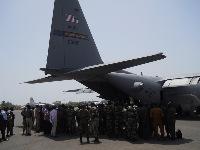 Students from the African Air Forces gather around a 934th AW C-130 in Senegal, Africa for training as part of the African Partnership Flight. (Courtesy photo).