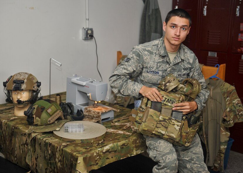 Senior Airman Devin Litton, 22nd Operations Support Squadron aircrew flight equipment journeyman, poses for a photo, July 18, 2014, at McConnell Air Force Base, Kansas. Litton has turned a skill set he has learned from his work, sewing, into an avid hobby. He modifies and creates tactical equipment in his free time. (U.S. Air Force photo/Airman 1st Class John Linzmeier) 

