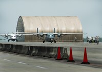 The last two C-145s on the Duke Field flightline prepare to taxi out for take off July 1.  All of the C-145s were prepared and launched July 1 in celebration of the Airmen of the 592nd Special Operations Maintenance Squadron and the 919th Special Operations Aircraft Maintenance Squadron taking over maintenance responsibilities from the contractor Nevada Corporation.  (U.S. Air Force photo/Maj. Terry Lisenbee)