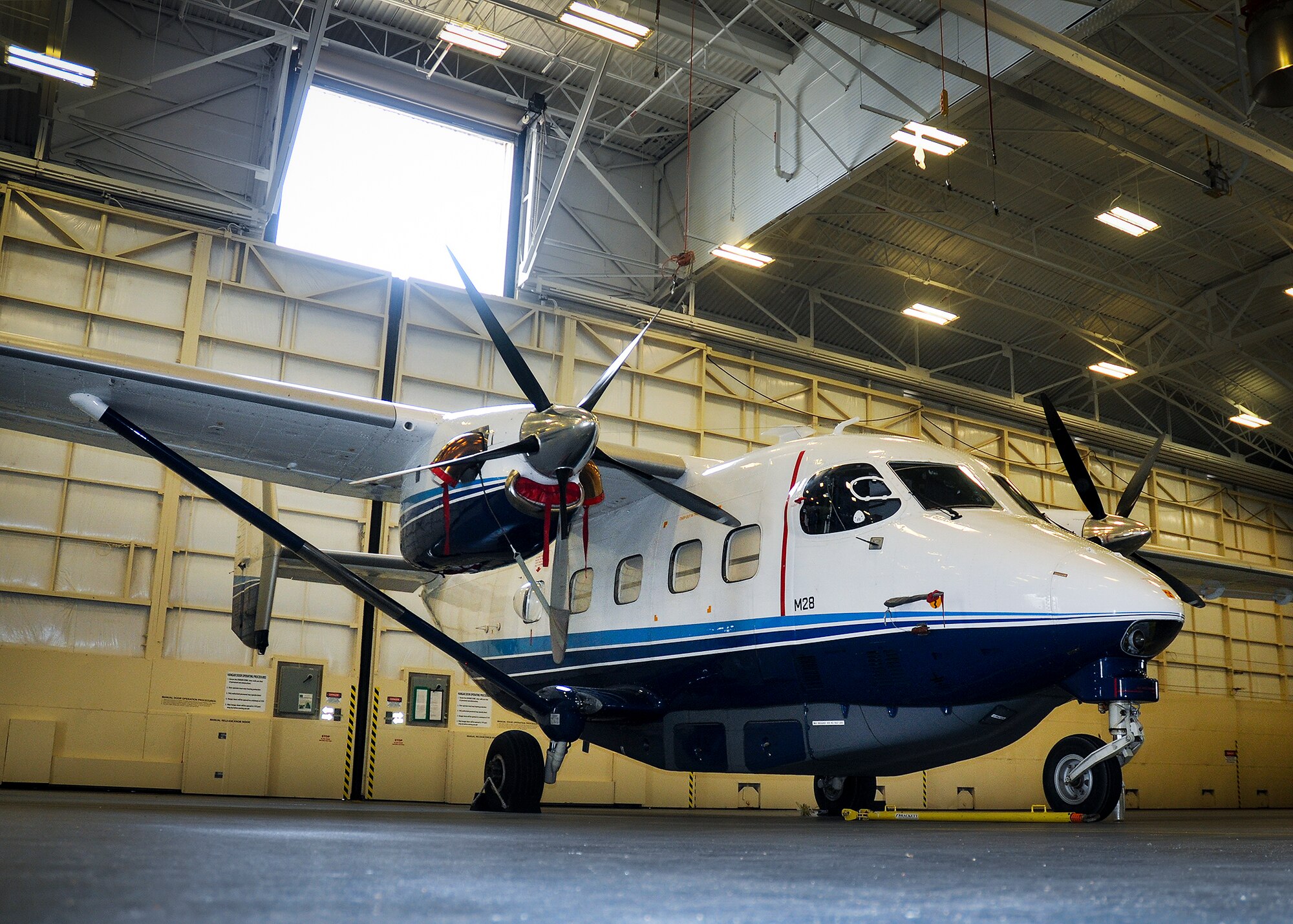 A C-145 sits in a hangar ready for a mission during a crew chief aircraft assignment ceremony at Duke Field, June 11.  The 592nd Special Operations Maintenance Squadron and the 919th Special Operations Aircraft Maintenance Squadron assigned a dedicated crew chief and assistant crew chief to each of the 16 C-145s at Duke Field.  Each aircraft has an active-duty and reserve crew chief assigned to it.  The squadrons took over maintenance responsibility for the aircraft on July 1.  (U.S. Air Force photo/Dan Neely)